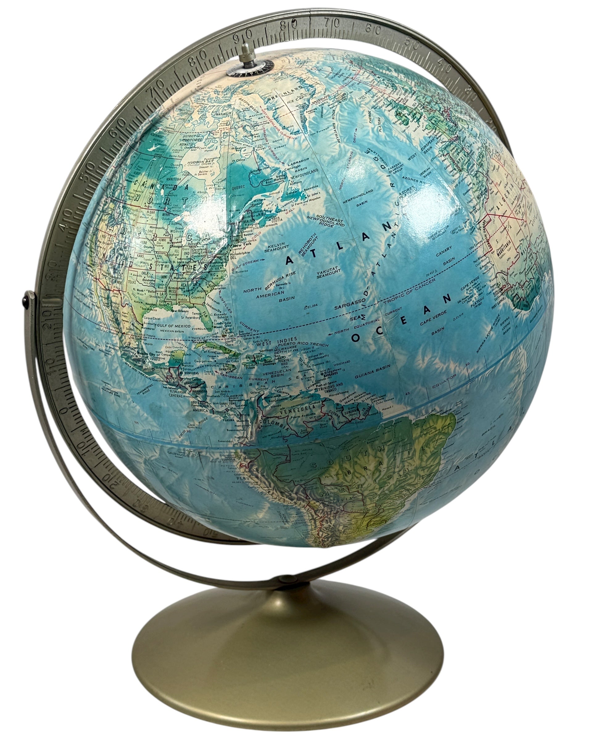 Vintage 1990 Rand McNally raised relief world globe showing USSR and unified Germany — Cold War era map with textured terrain and metal stand, Made in USA.