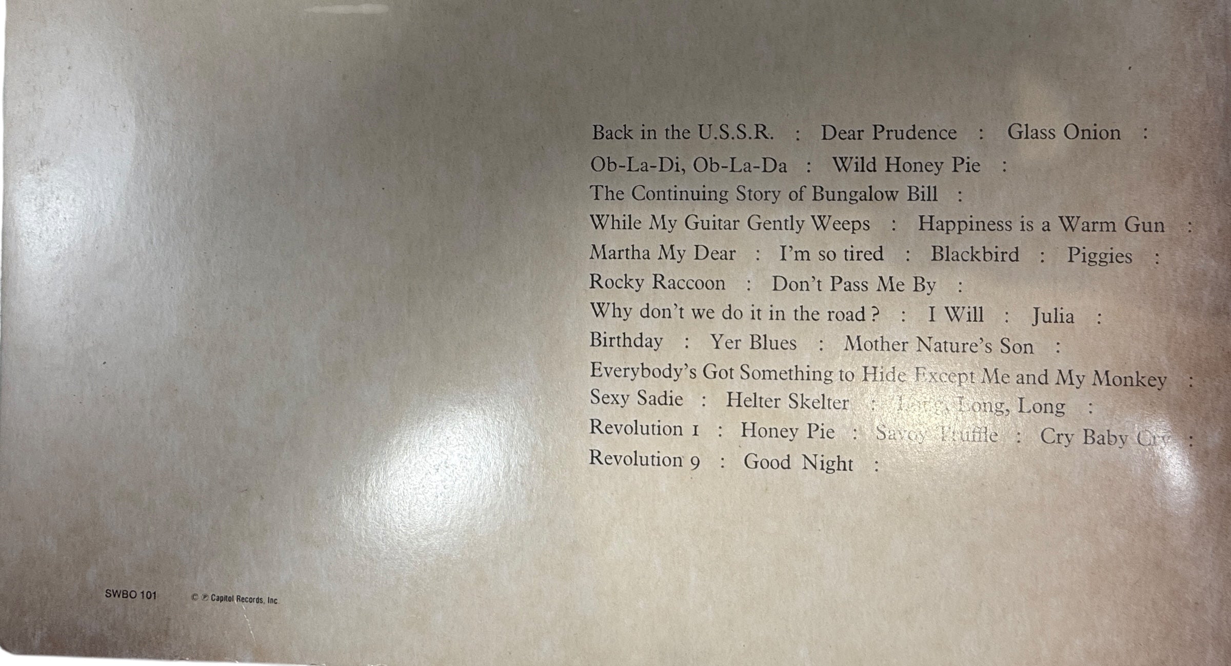 Complete Canadian pressing of The Beatles White Album with poster and all four photos. Classic SWBO-101 2LP set for collectors and vinyl fans.
