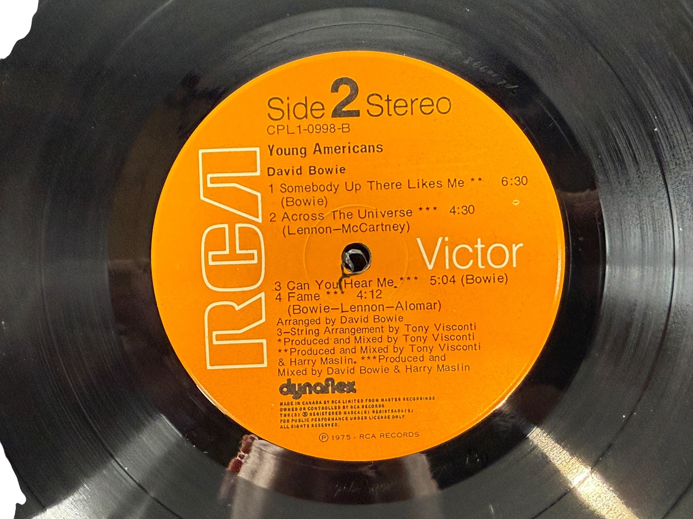 1975 David Bowie Young Americans Canadian RCA Dynaflex LP. G/VG condition classic soul-era album. Collectible vintage Bowie vinyl.
