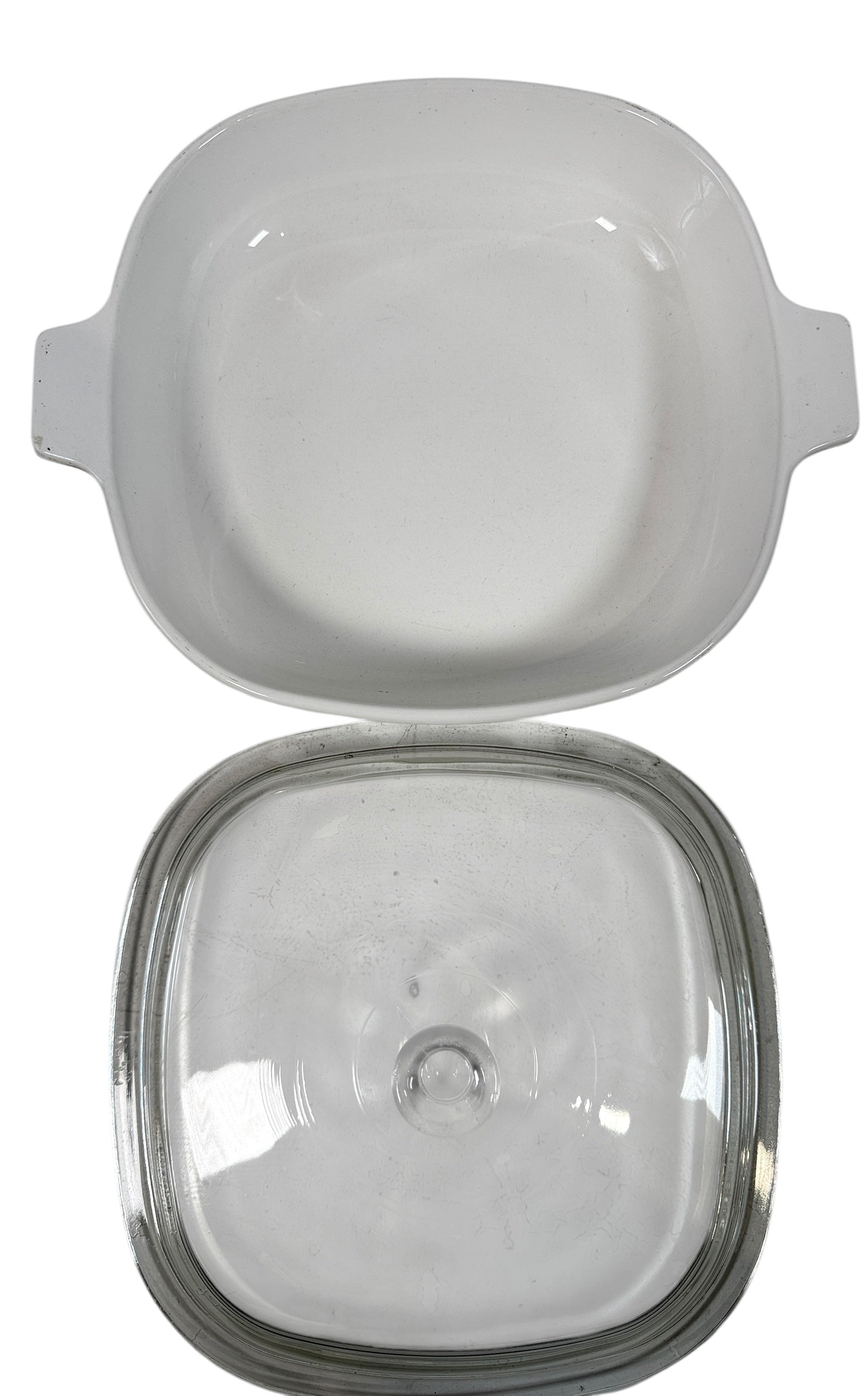 Vintage Corning Ware P-9 Blue Cornflower 9-inch casserole with glass lid. Canadian-made pyroceram cookware. Clean interior and functional vintage condition.