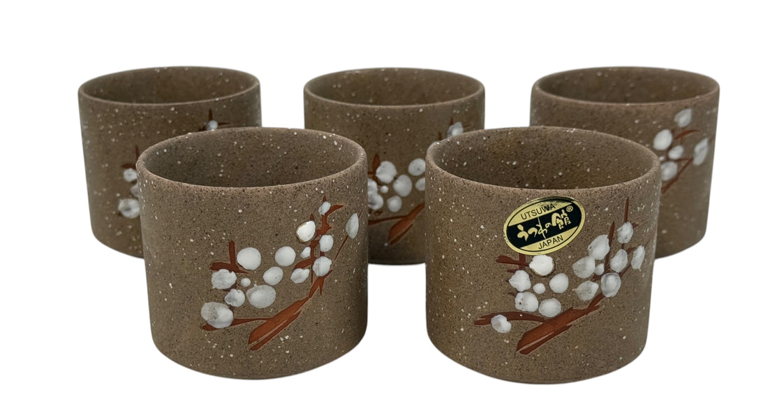 UTSUWA Japan stoneware tea set with plum blossom design, boxed with teapot and six cups. Excellent condition. Great Japanese ceramic gift set.