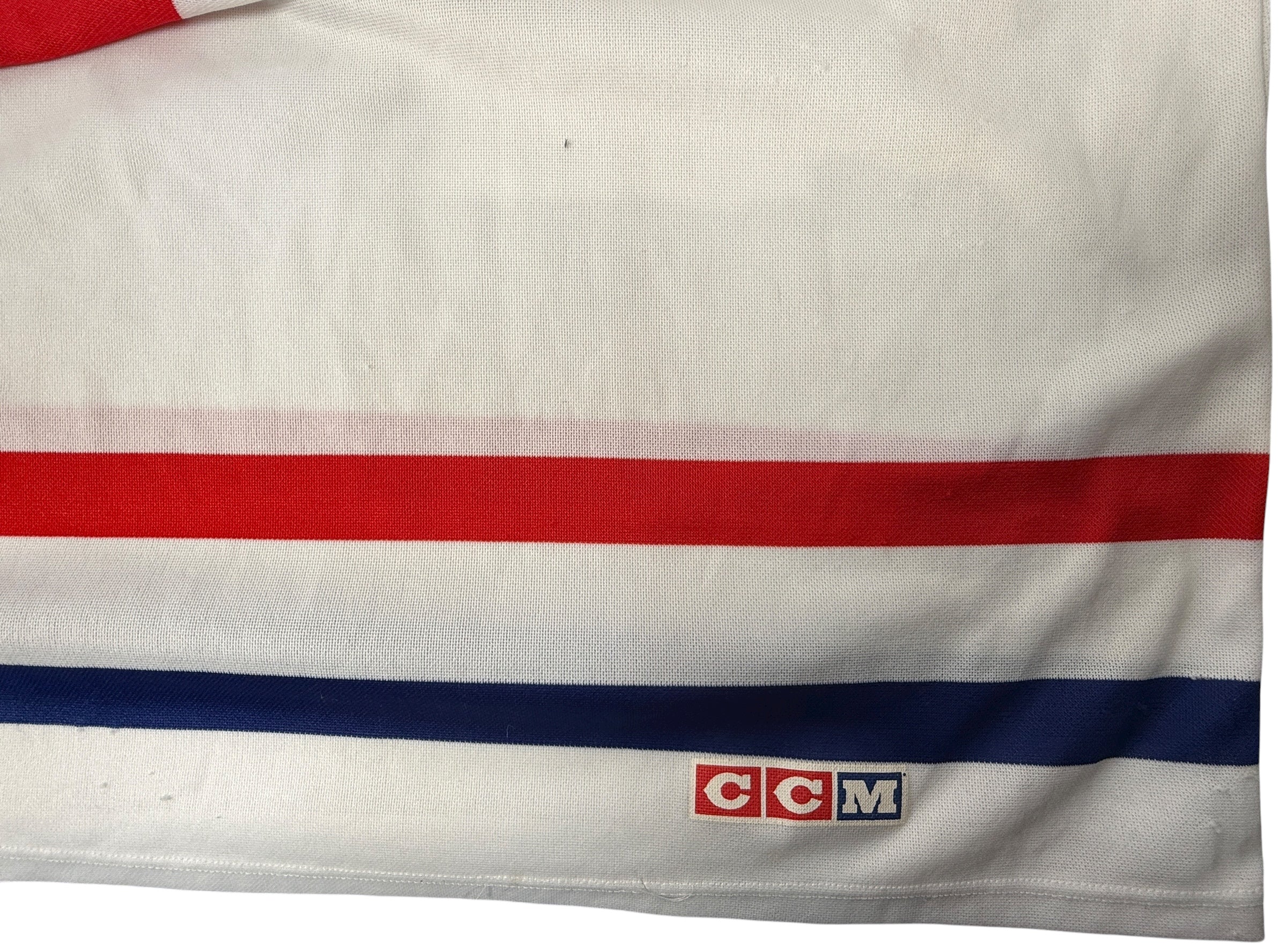 Vintage 1990s CCM Montréal Canadiens hockey jersey. Classic Habs colours, made in Canada. Clean condition. Ideal for fans and collectors.