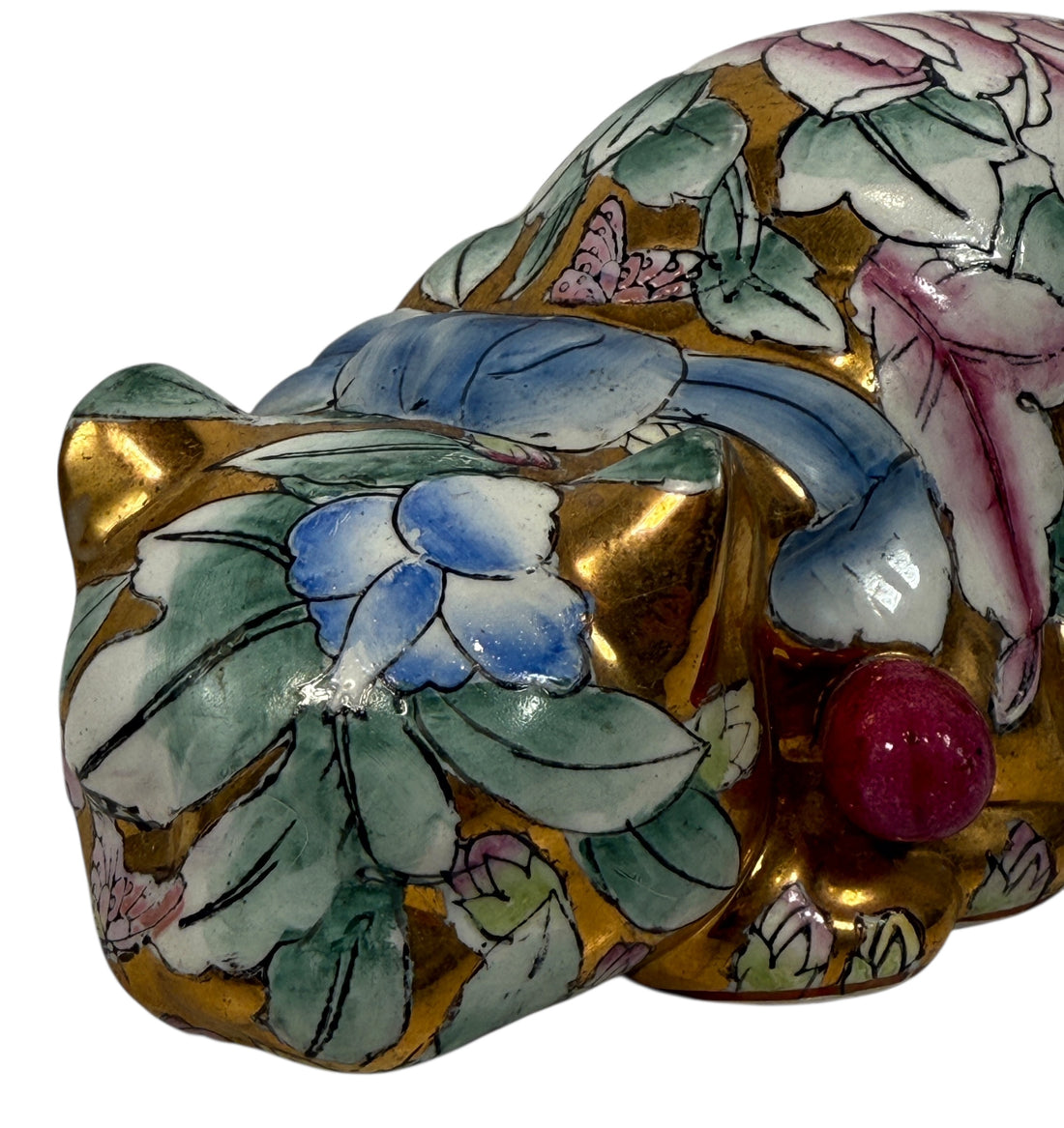 Large 10” Famille Rose porcelain reclining cat with floral enamels and gilt details. Mid-century Chinese export decor piece. Beautiful display sculpture.