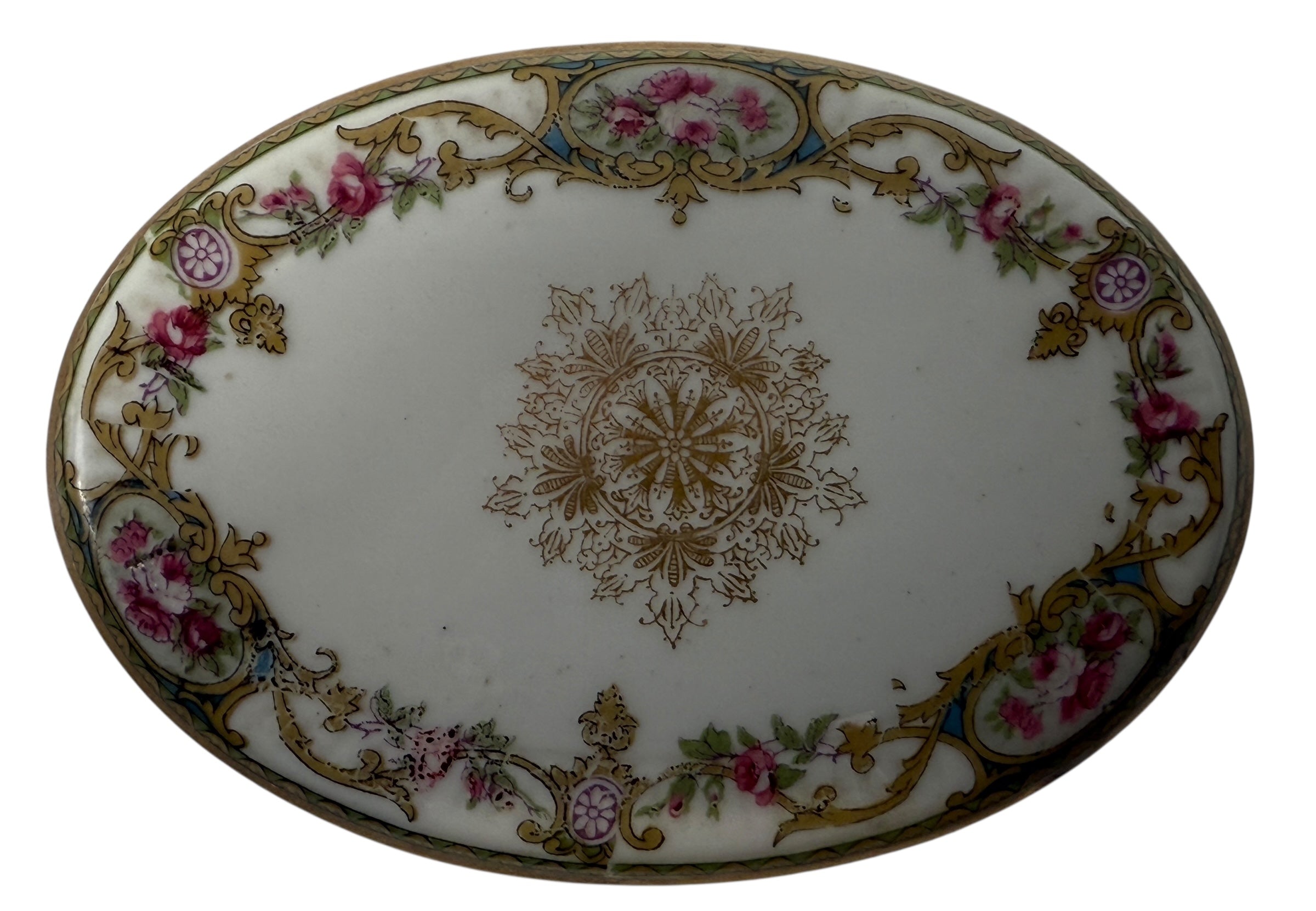 Antique French-style porcelain trinket box with gilt bronze legs, c.1900. Elegant vanity décor with floral details and classic Belle Époque charm.