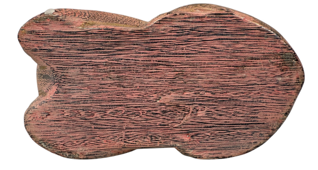 Hand-carved wooden cat sculpture in folk art style. Solid wood, decorative carved texture, warm natural finish. Unique décor piece for cat lovers.