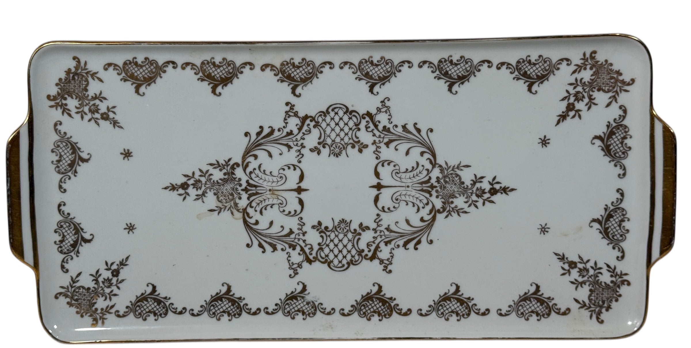 Vintage German porcelain serving tray by R.P.M. with ornate gold gilt and floral décor. Mid-century elegance for tea service or display.