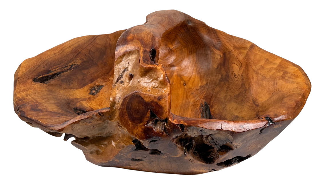 Wooden bowl with natural edge and texture on a white background