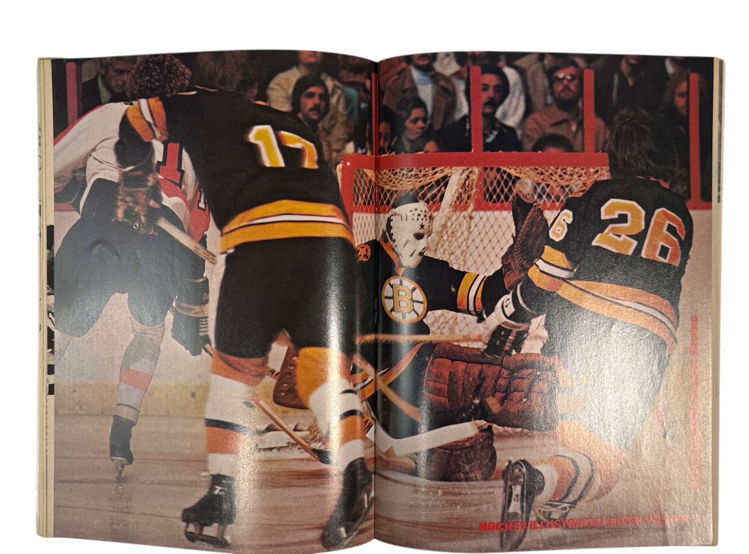 Open book showing images of hockey players in action