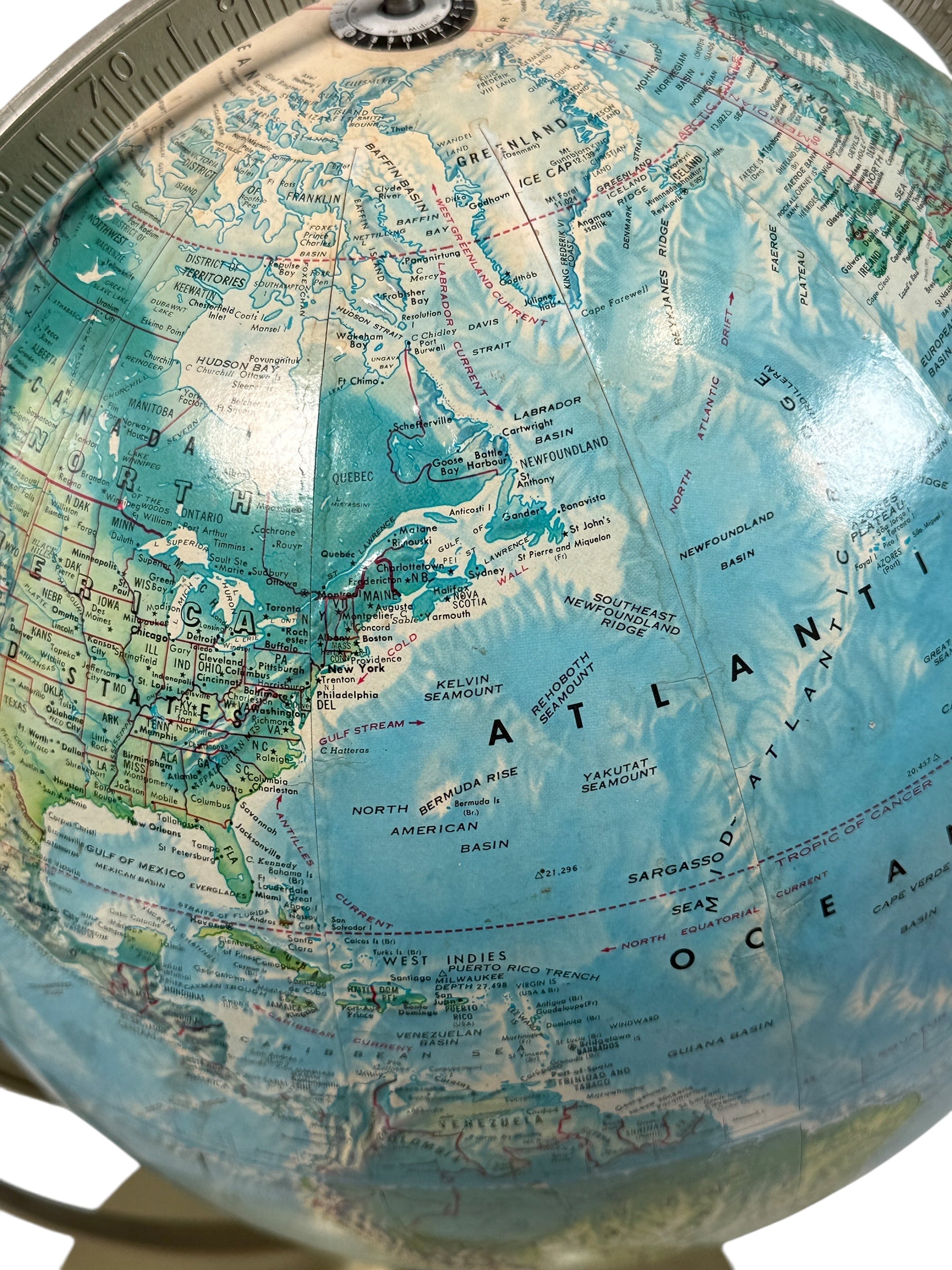 Vintage 1990 Rand McNally raised relief world globe showing USSR and unified Germany — Cold War era map with textured terrain and metal stand, Made in USA.