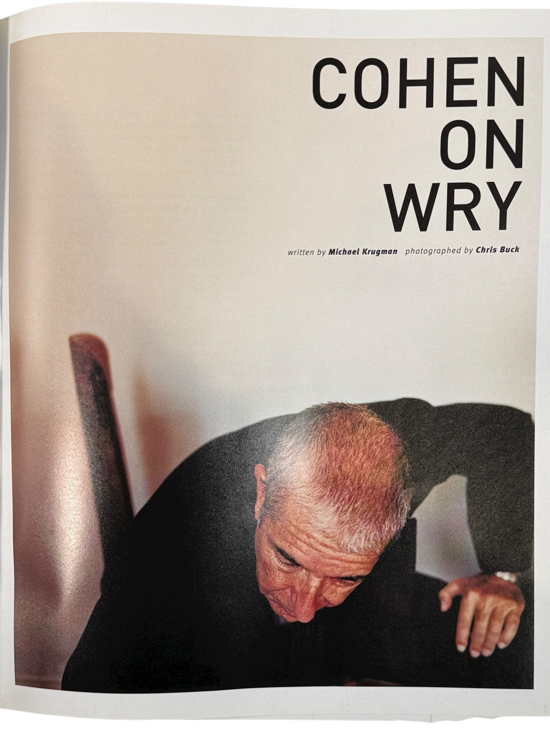 Book cover with a man leaning forward and text 'COHEN ON WRY' on a beige background
