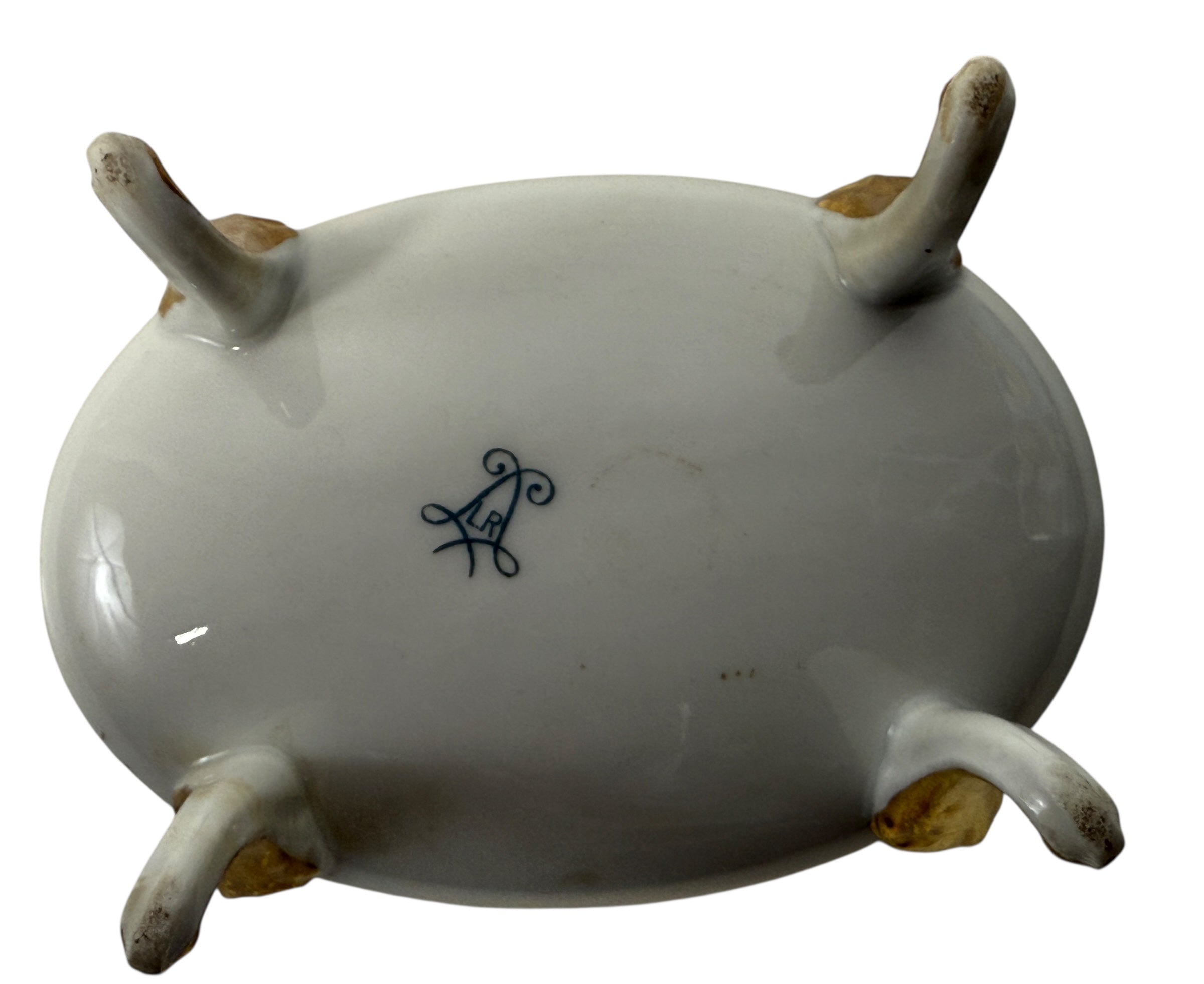 Antique French-style porcelain trinket box with gilt bronze legs, c.1900. Elegant vanity décor with floral details and classic Belle Époque charm.