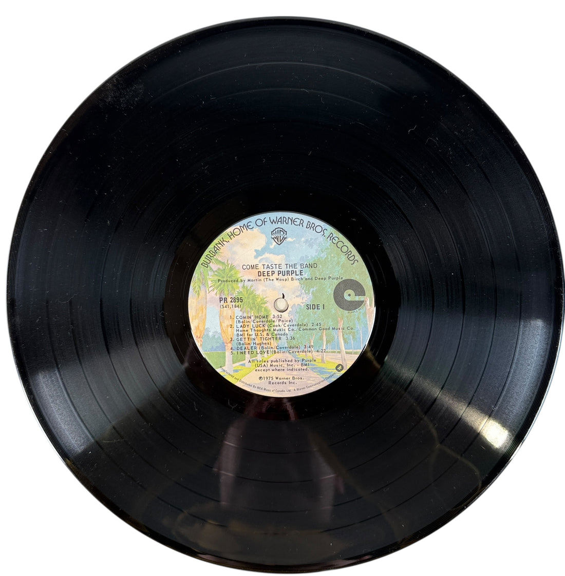 1975 Deep Purple Come Taste the Band LP on Warner Bros. Canadian pressing. VG+ vinyl, VG sleeve, classic hard rock from the Tommy Bolin era.