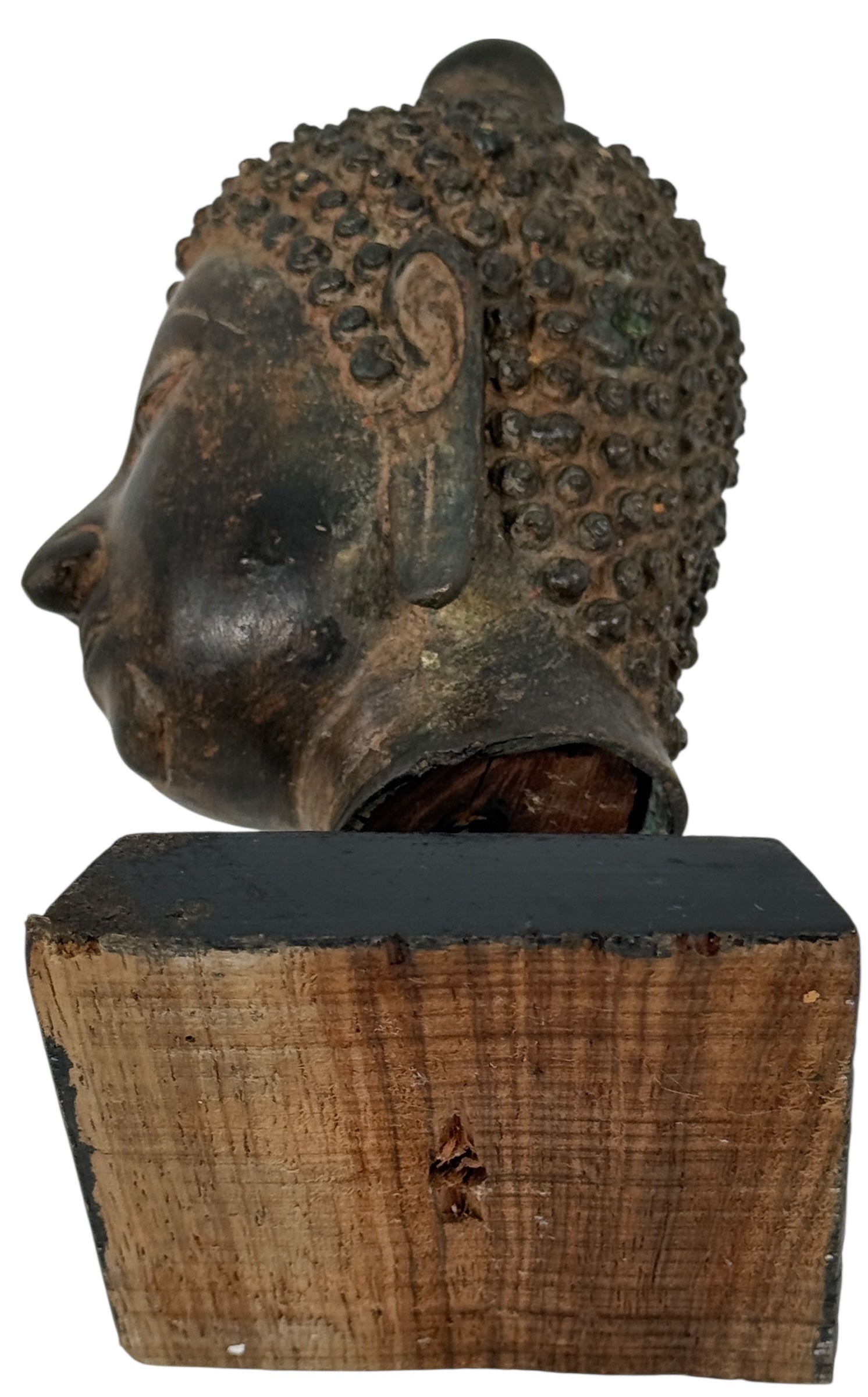 Wooden sculpture of a head on a wooden base