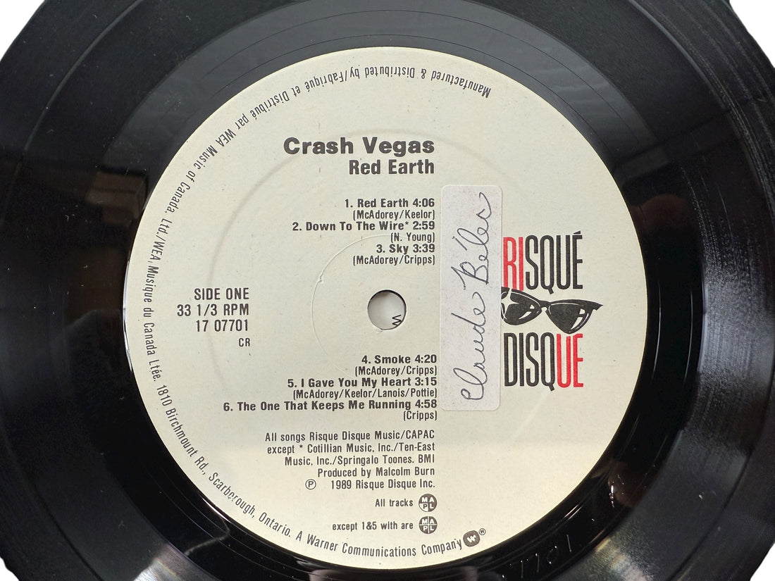 1989 Canadian LP Red Earth by Crash Vegas on Risqué Disque/WEA. VG+ vinyl, lyric sleeve included. Rare folk-rock pressing from late-’80s Canada.