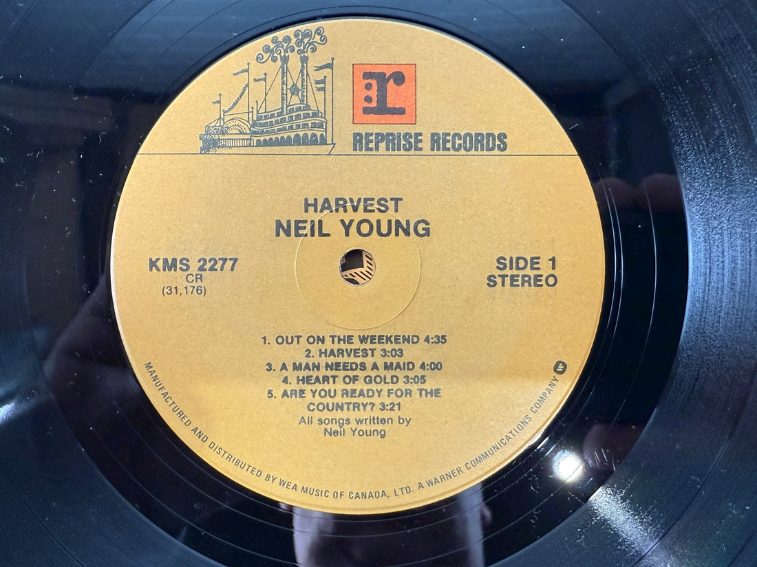 Original 1972 Canadian Harvest LP by Neil Young on Reprise KMS 2277. VG+ vinyl, gatefold cover, includes “Heart of Gold” and “Old Man.”