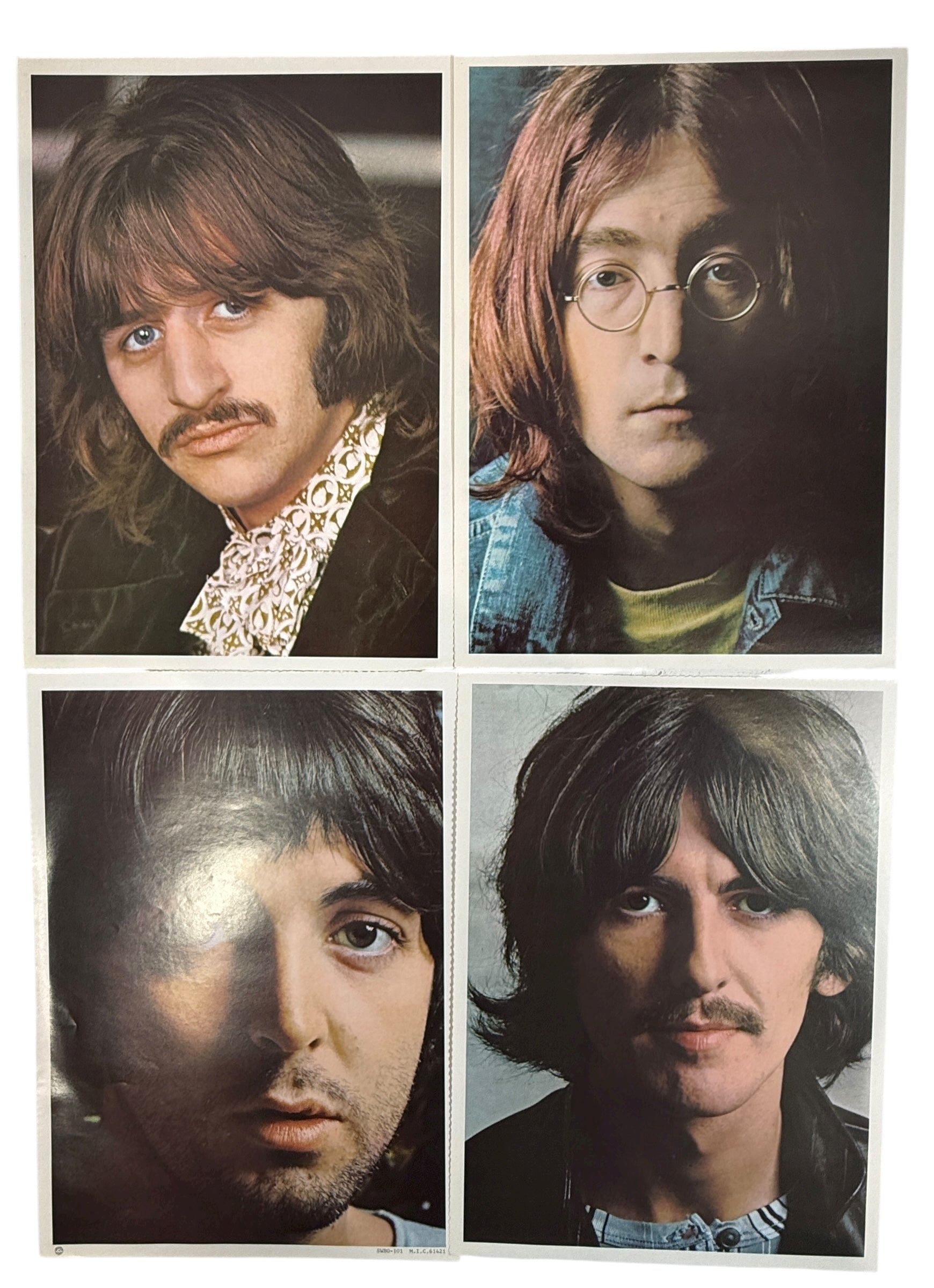 

Complete Canadian pressing of The Beatles White Album with poster and all four photos. Classic SWBO-101 2LP set for collectors and vinyl fans.