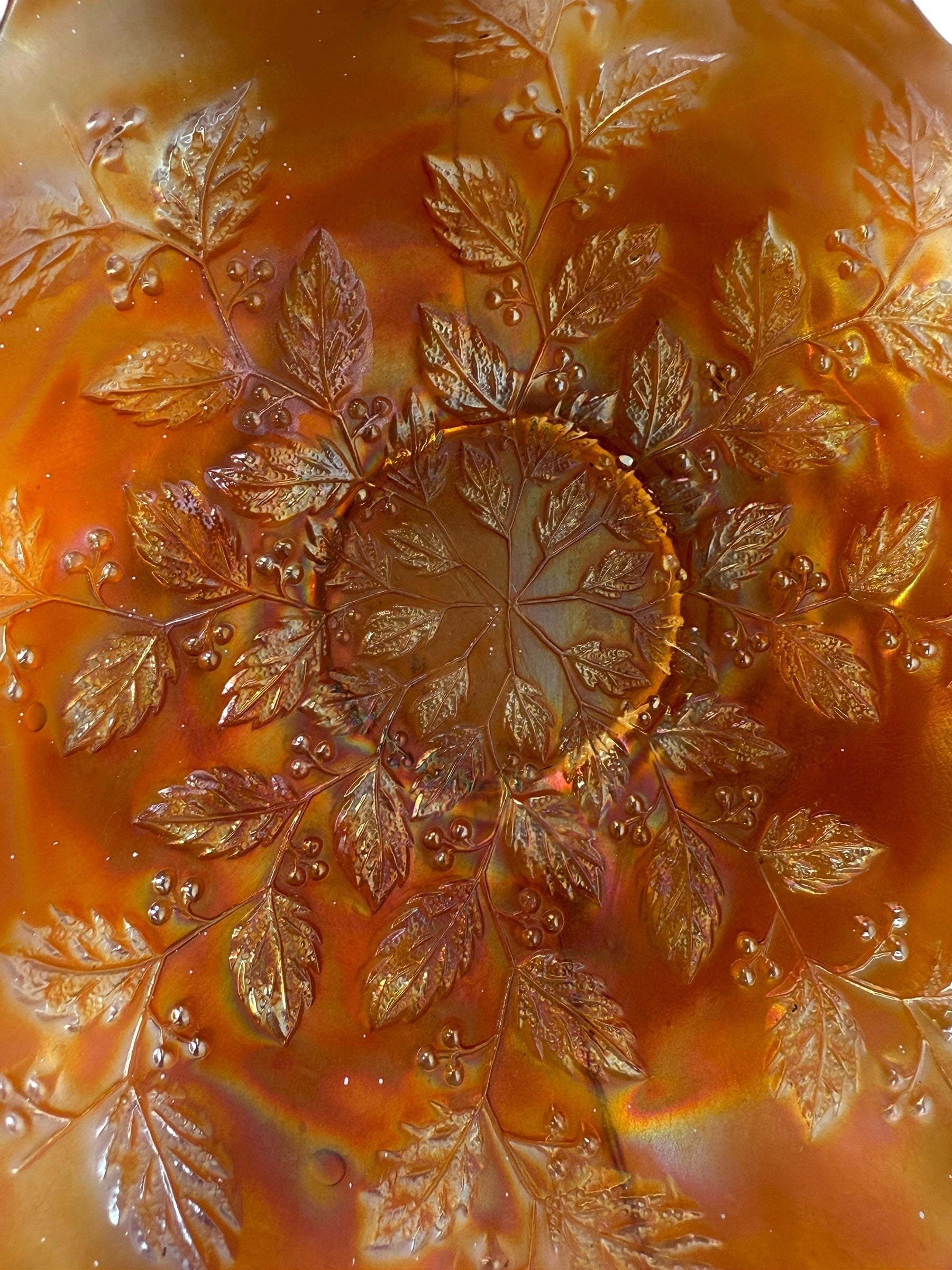 Vintage Fenton marigold carnival glass bowl in Leaf &amp; Berry pattern with ruffled edge. Strong iridescence, early 1900s American glass. VG condition.