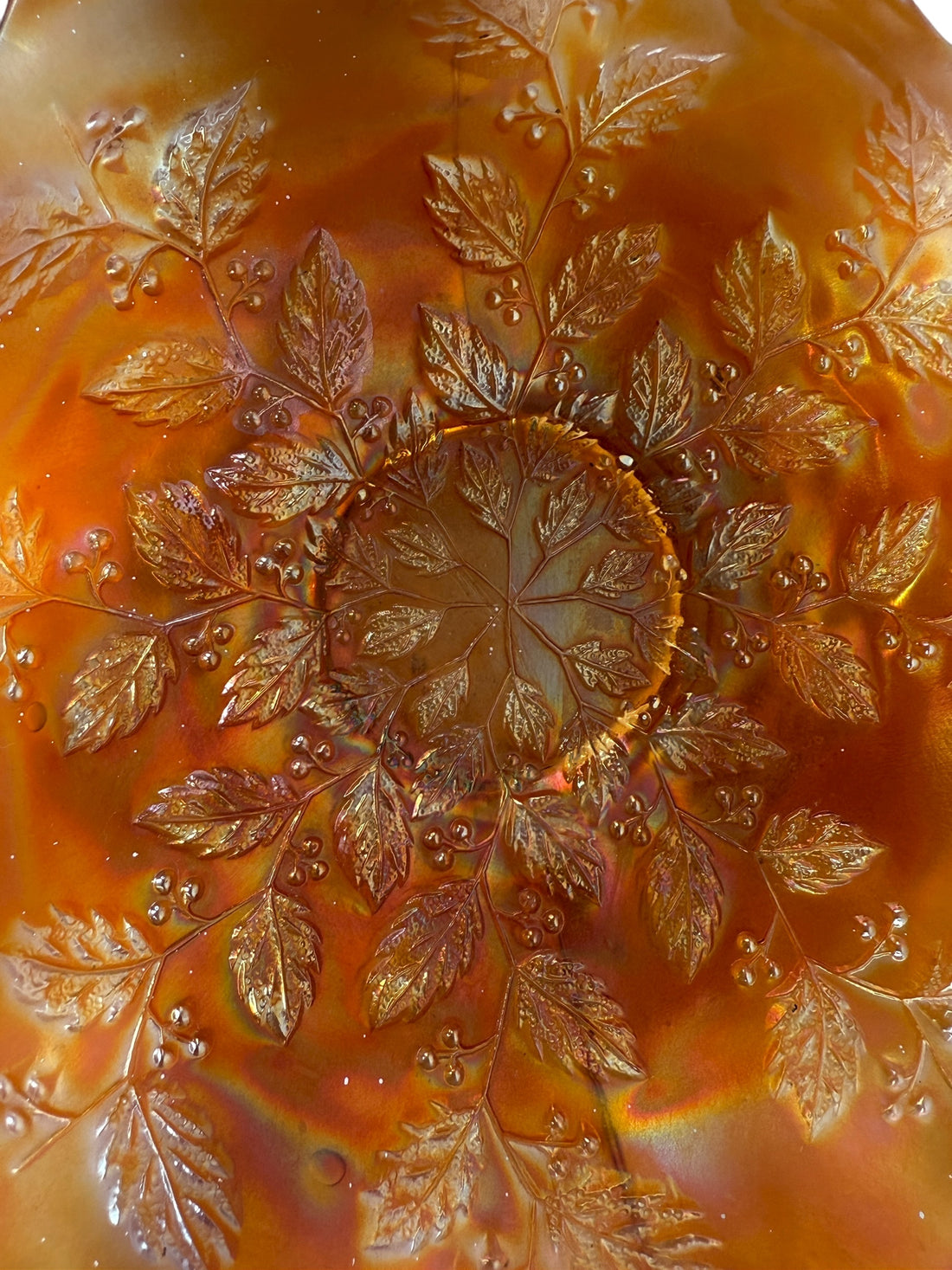 Vintage Fenton marigold carnival glass bowl in Leaf &amp; Berry pattern with ruffled edge. Strong iridescence, early 1900s American glass. VG condition.