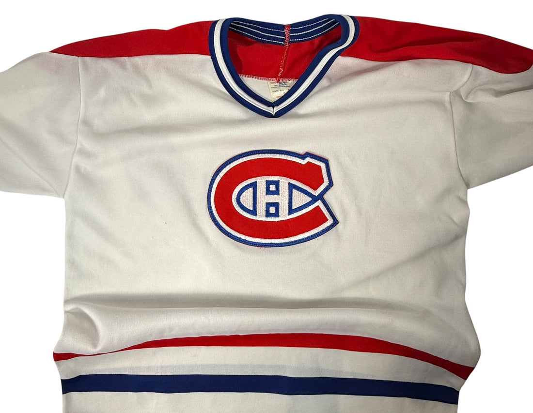 Vintage 1990s CCM Montréal Canadiens hockey jersey. Classic Habs colours, made in Canada. Clean condition. Ideal for fans and collectors.