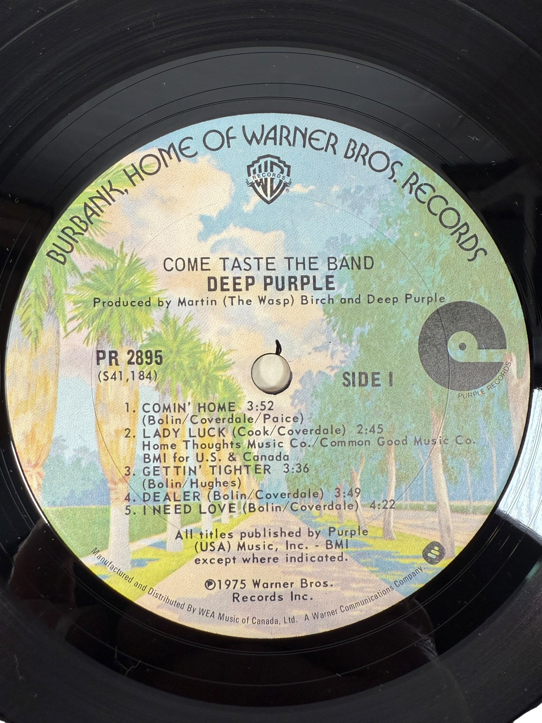 1975 Deep Purple Come Taste the Band LP on Warner Bros. Canadian pressing. VG+ vinyl, VG sleeve, classic hard rock from the Tommy Bolin era.
