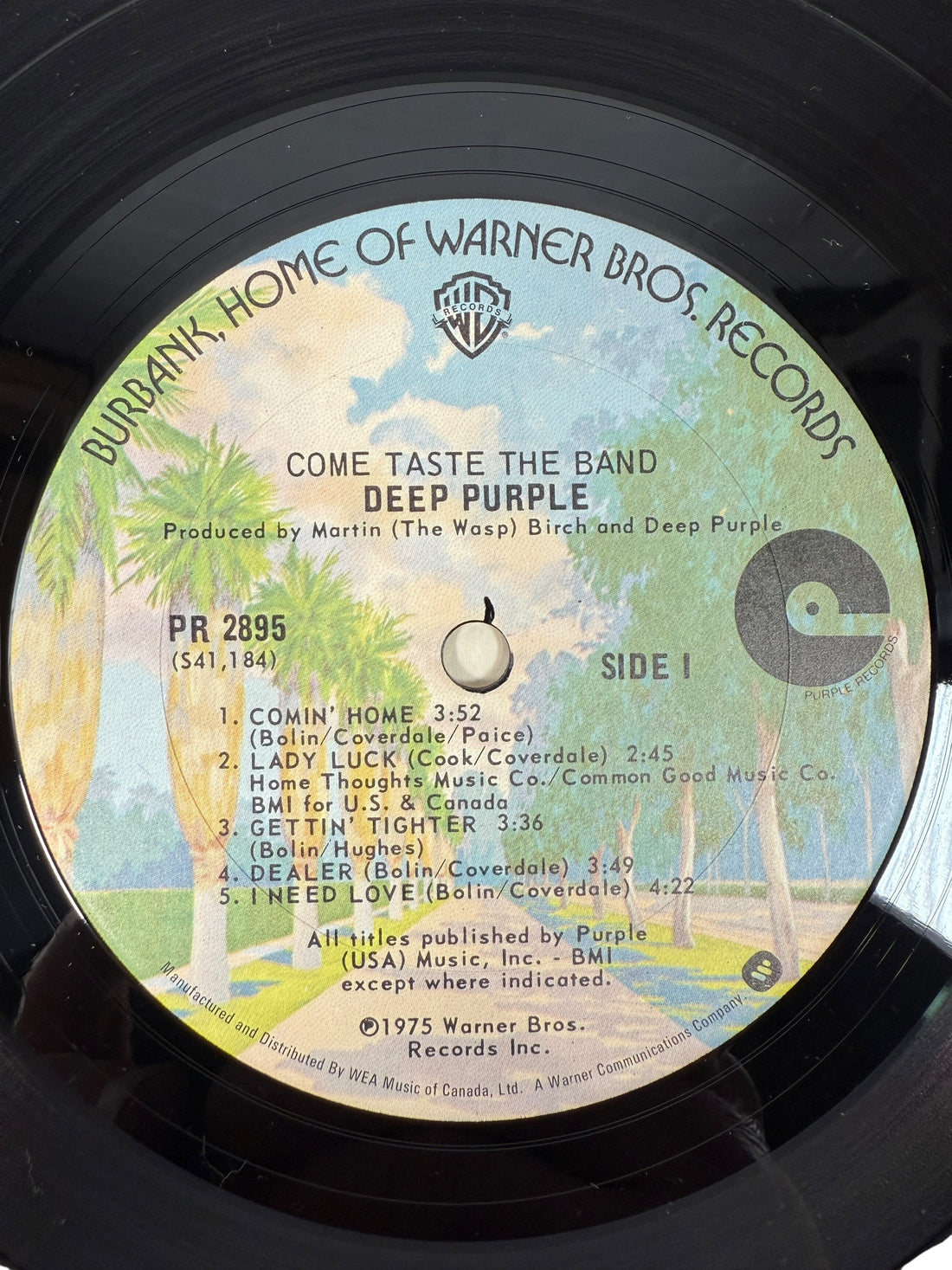 1975 Deep Purple Come Taste the Band LP on Warner Bros. Canadian pressing. VG+ vinyl, VG sleeve, classic hard rock from the Tommy Bolin era.