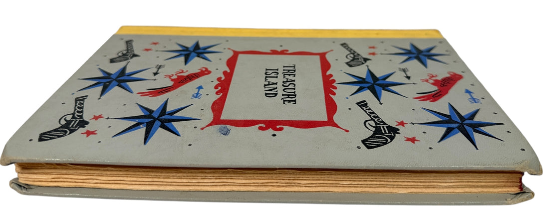 A 1954 Junior Deluxe Illustrated edition of Treasure Island with bright cover art. Vintage children’s classic, clean pages, ideal for décor or gifting.