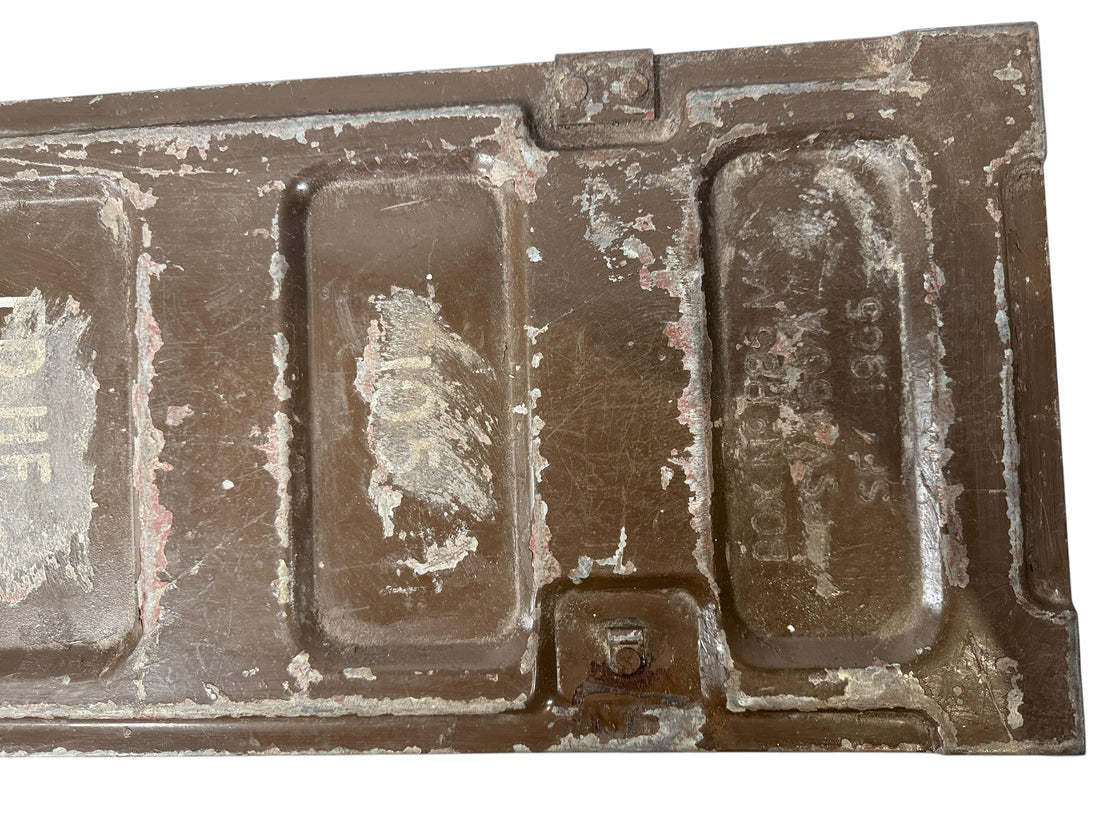 Vintage chocolate mold with multiple compartments on a white background