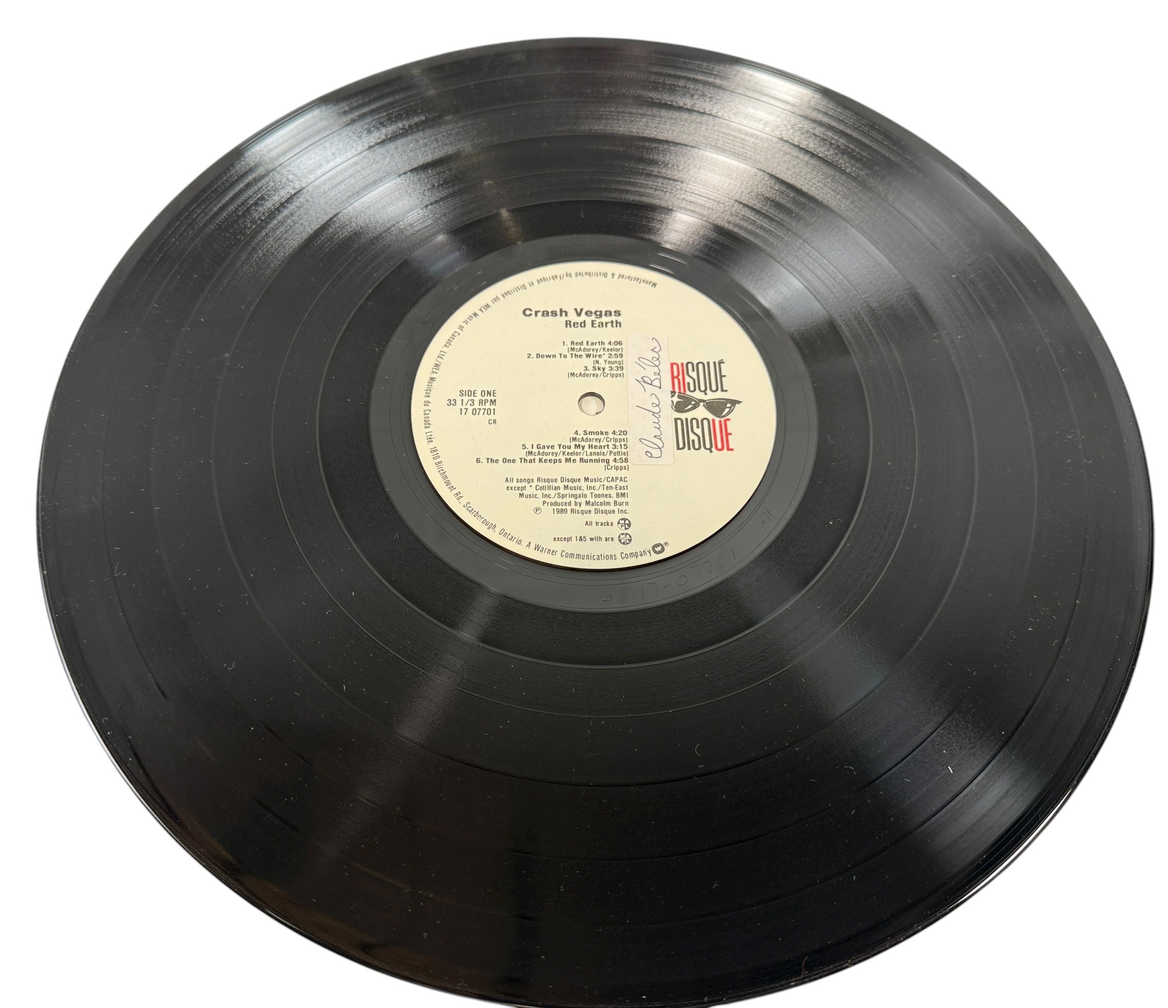 1989 Canadian LP Red Earth by Crash Vegas on Risqué Disque/WEA. VG+ vinyl, lyric sleeve included. Rare folk-rock pressing from late-’80s Canada.