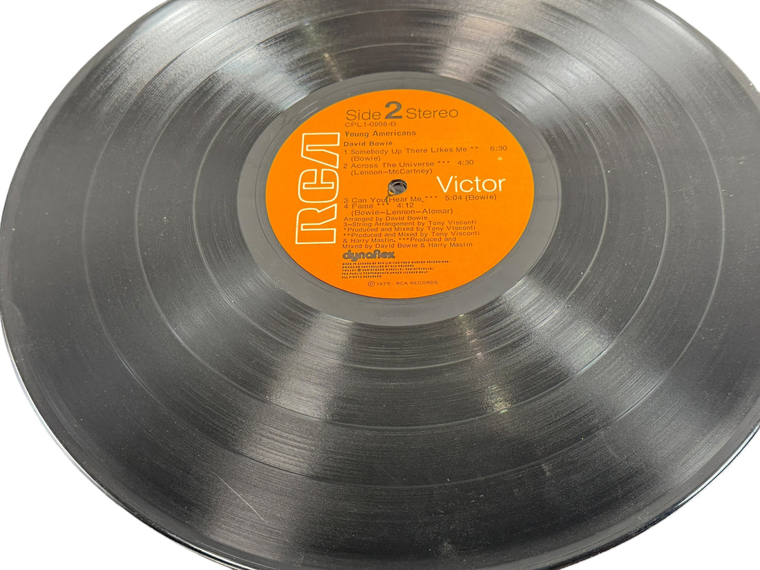 1975 David Bowie Young Americans Canadian RCA Dynaflex LP. G/VG condition classic soul-era album. Collectible vintage Bowie vinyl.