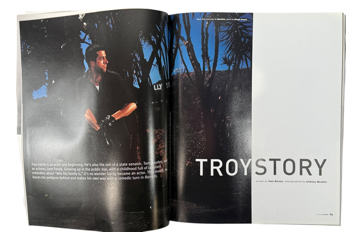 Vintage Flaunt Magazine Oct 2001 with Ben Stiller cover and Leonard Cohen feature. VG+ with original You Glow Ghoul insert. Collectible early 2000s issue.