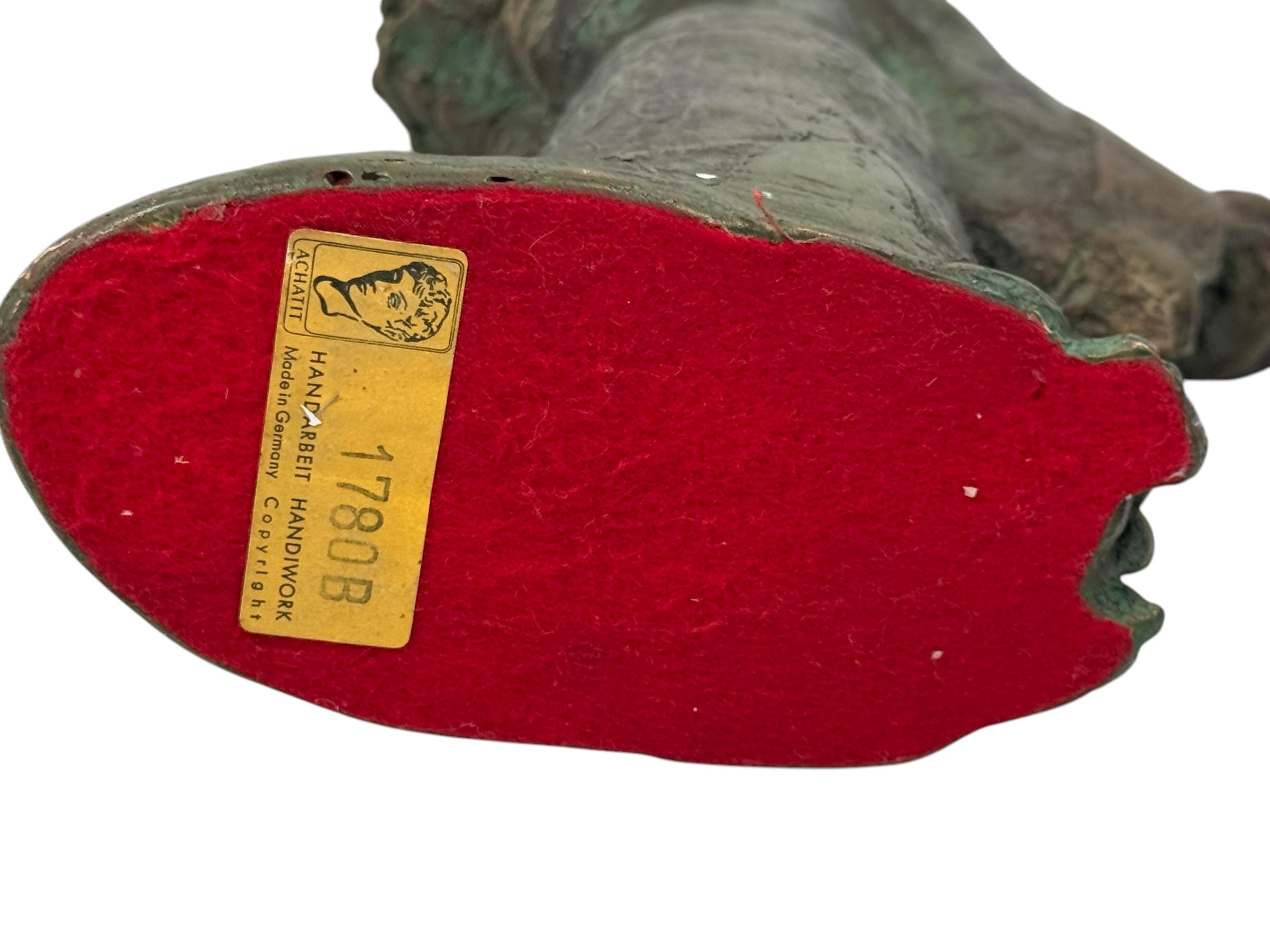 Mid-century ACHATIT Handarbeit 1780B German composite figurine with green patina. Labeled, detailed, collectible sculpture ideal for vintage decor collectors.