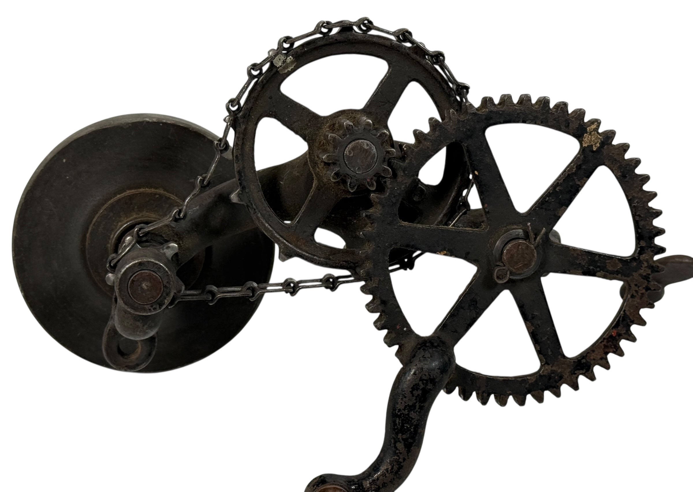 Working antique clamp-on cast-iron grinder with chain drive. Compact 19th-century sharpening tool, fully functional. Industrial décor or collector piece.