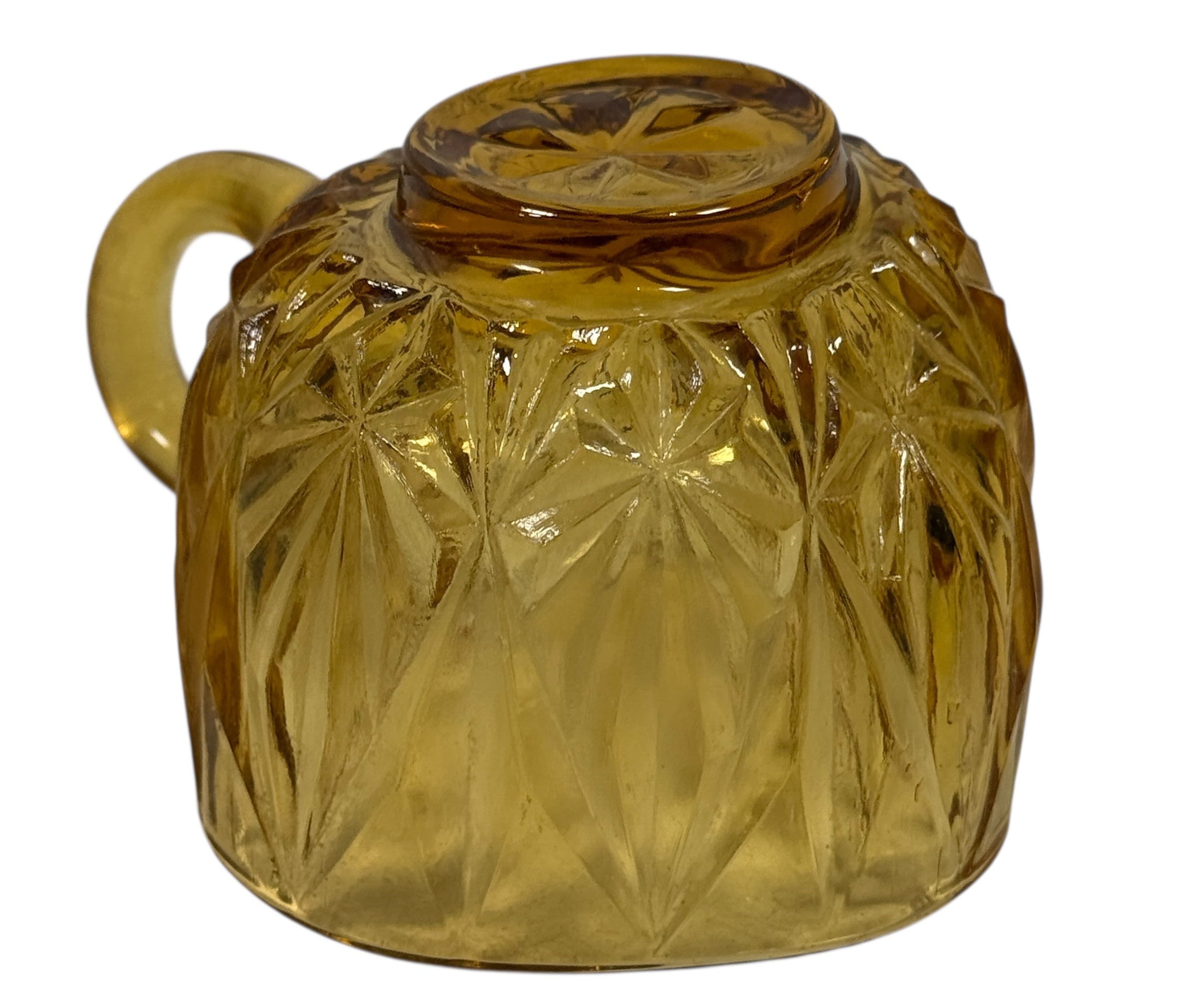 Vintage mid-century amber glass punch bowl set with cups and ladle. Classic starburst pattern, complete set, perfect for retro entertaining.