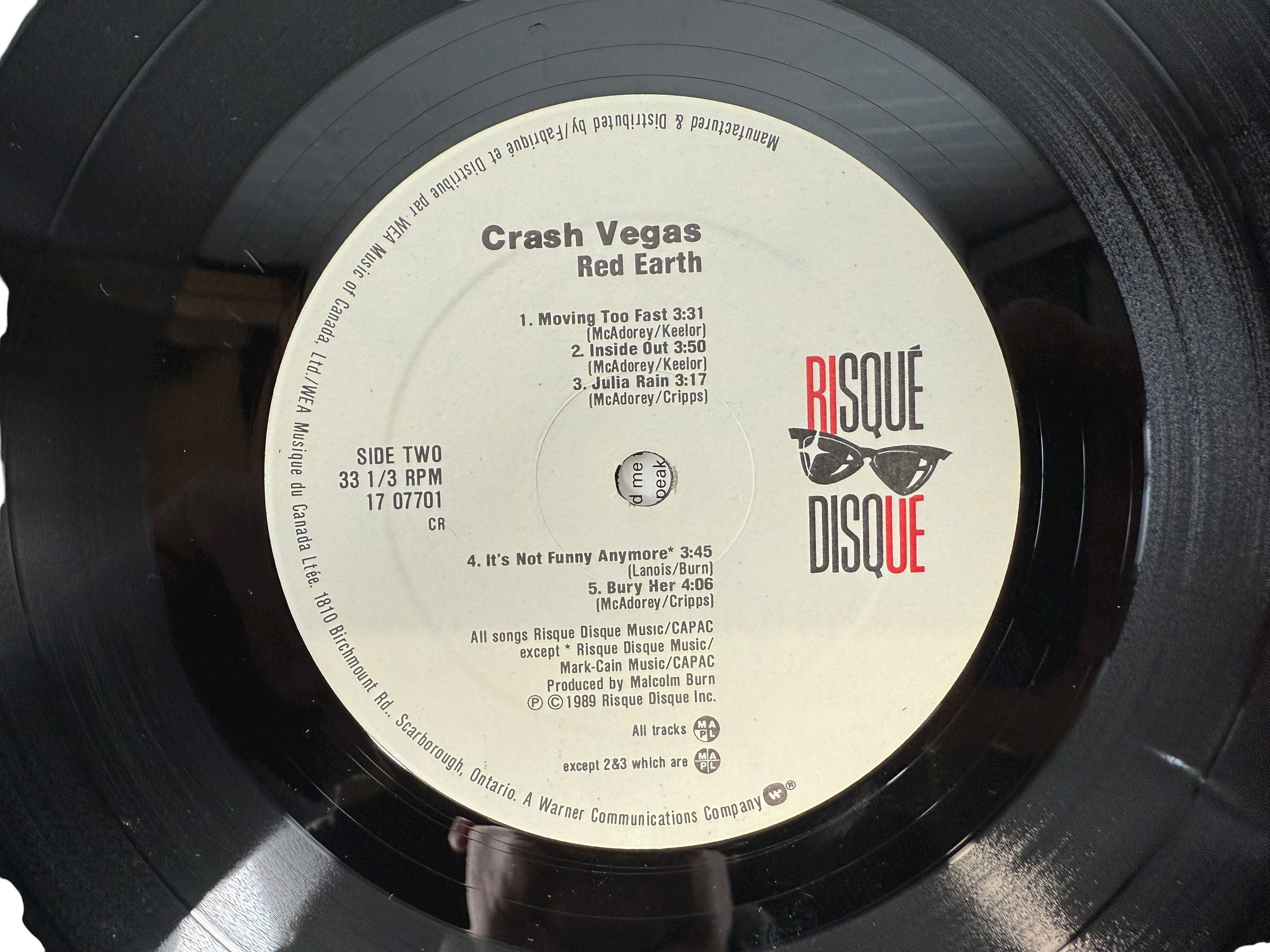 1989 Canadian LP Red Earth by Crash Vegas on Risqué Disque/WEA. VG+ vinyl, lyric sleeve included. Rare folk-rock pressing from late-’80s Canada.