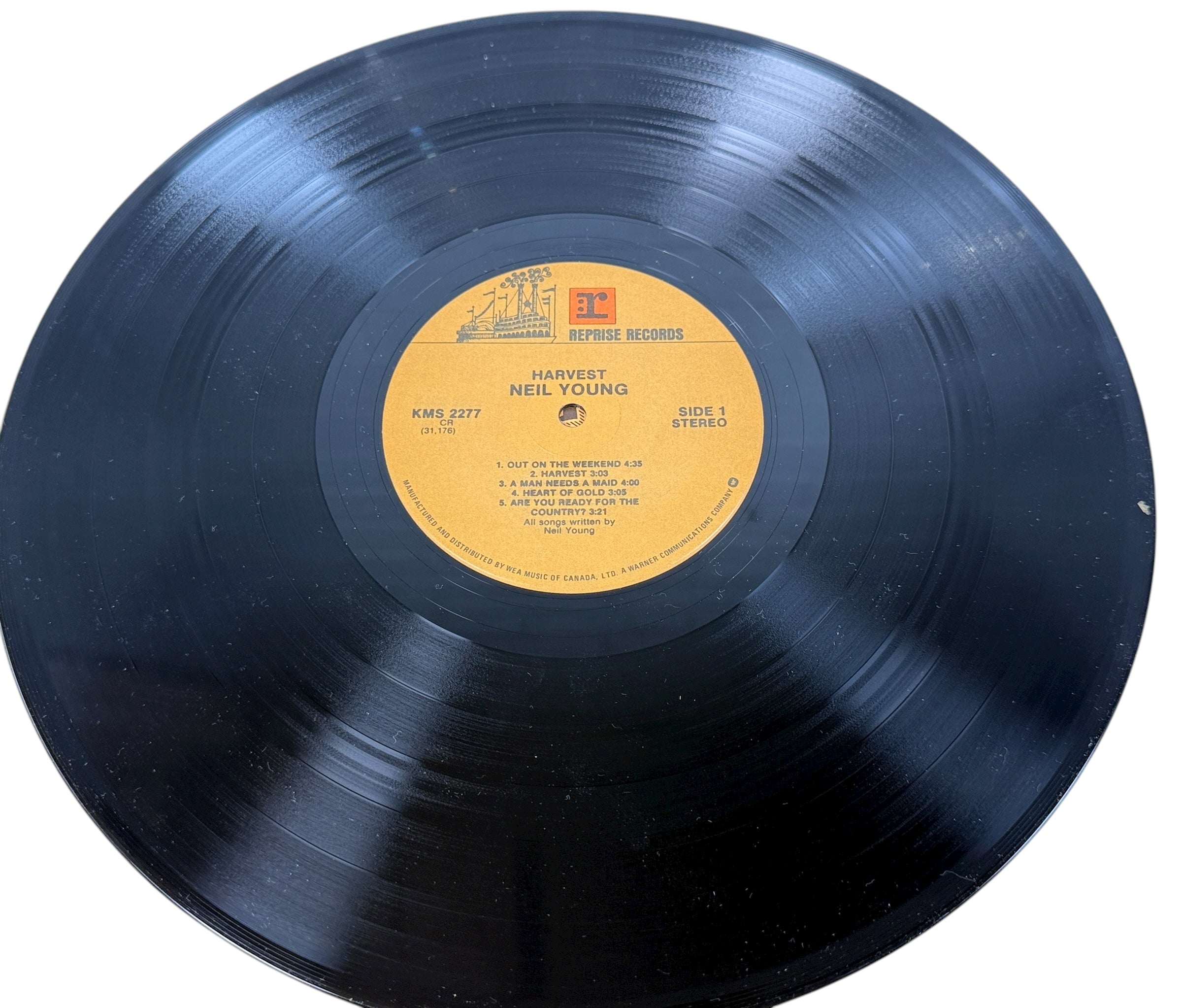 Original 1972 Canadian Harvest LP by Neil Young on Reprise KMS 2277. VG+ vinyl, gatefold cover, includes “Heart of Gold” and “Old Man.”