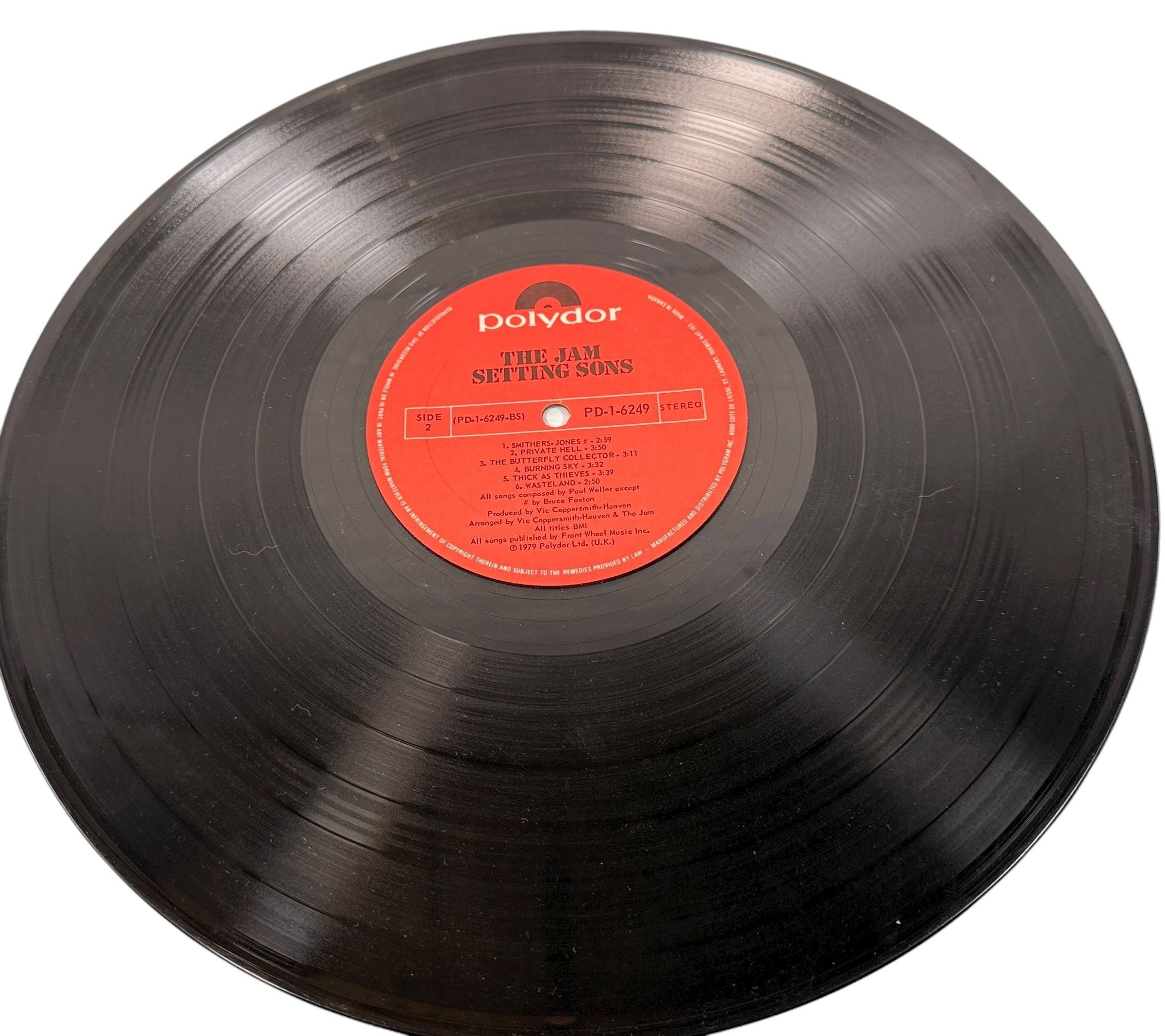 Vintage 1979 The Jam Setting Sons LP on Polydor, U.S. pressing. VG play copy with clean labels and original sleeve. Classic Mod Revival essential.