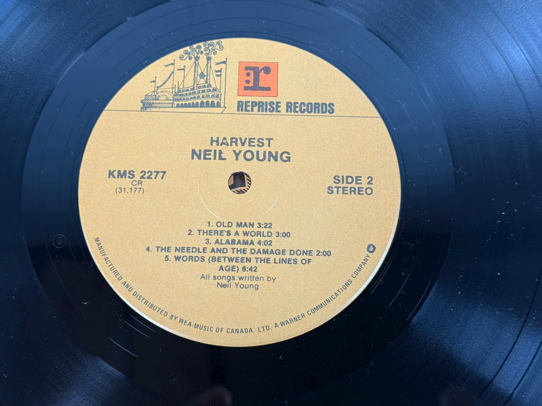 Original 1972 Canadian Harvest LP by Neil Young on Reprise KMS 2277. VG+ vinyl, gatefold cover, includes “Heart of Gold” and “Old Man.”