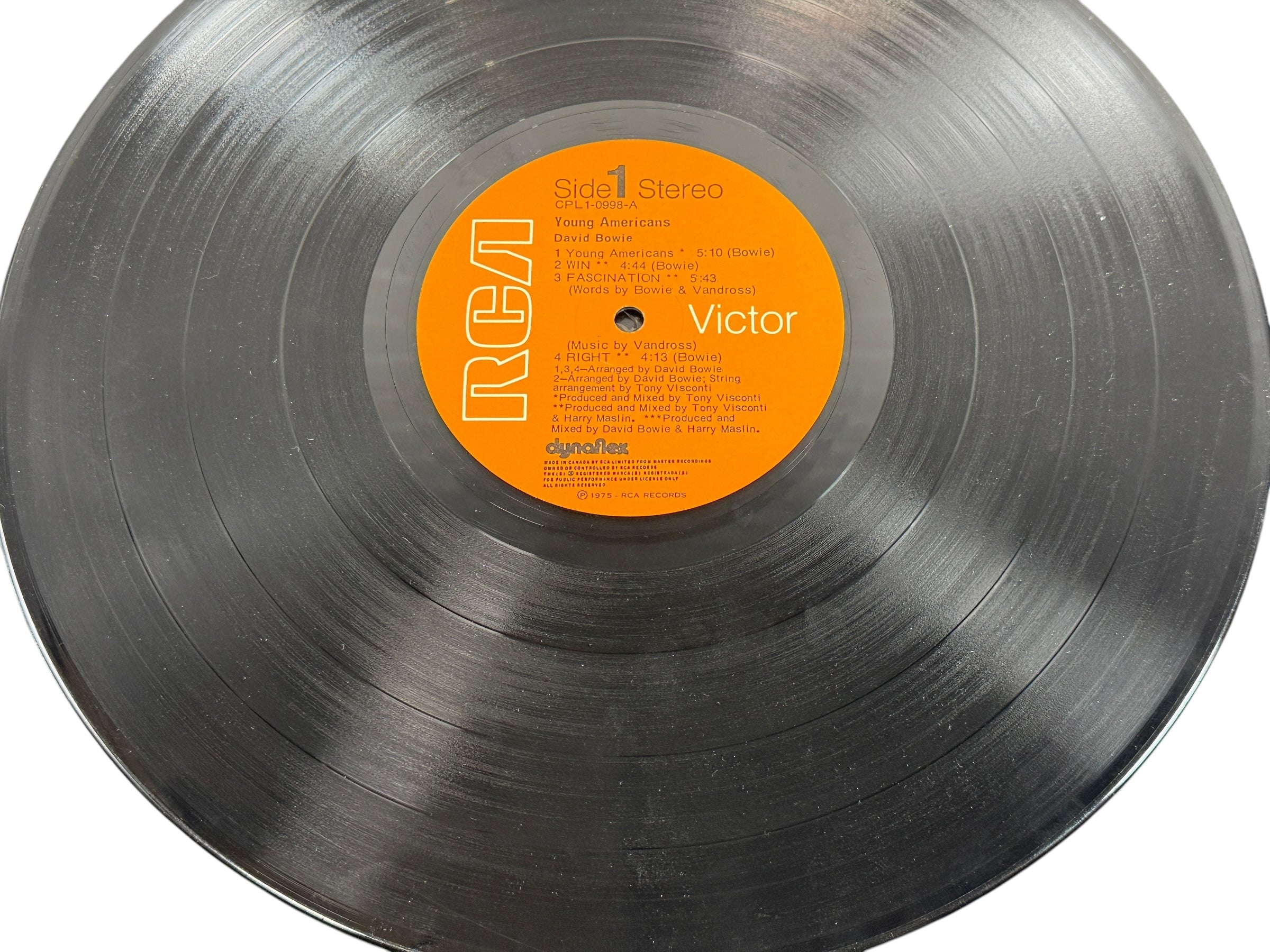1975 David Bowie Young Americans Canadian RCA Dynaflex LP. G/VG condition classic soul-era album. Collectible vintage Bowie vinyl.