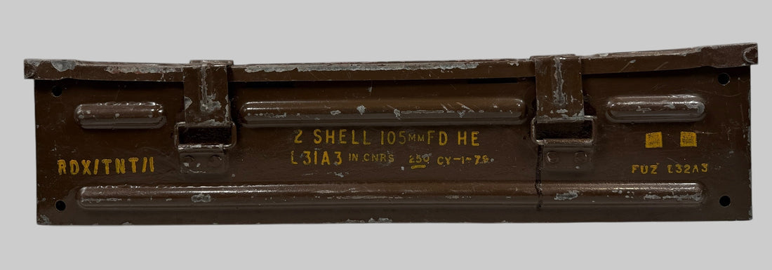 Metallic box with text and markings on a gray background