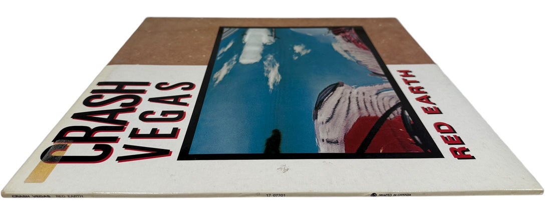 1989 Canadian LP Red Earth by Crash Vegas on Risqué Disque/WEA. VG+ vinyl, lyric sleeve included. Rare folk-rock pressing from late-’80s Canada.