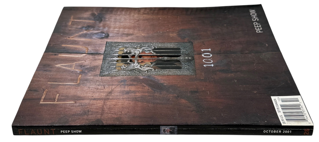 Vintage Flaunt Magazine Oct 2001 with Ben Stiller cover and Leonard Cohen feature. VG+ with original You Glow Ghoul insert. Collectible early 2000s issue.