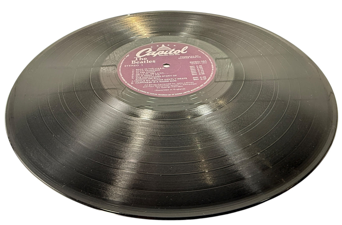 Complete Canadian pressing of The Beatles White Album with poster and all four photos. Classic SWBO-101 2LP set for collectors and vinyl fans.