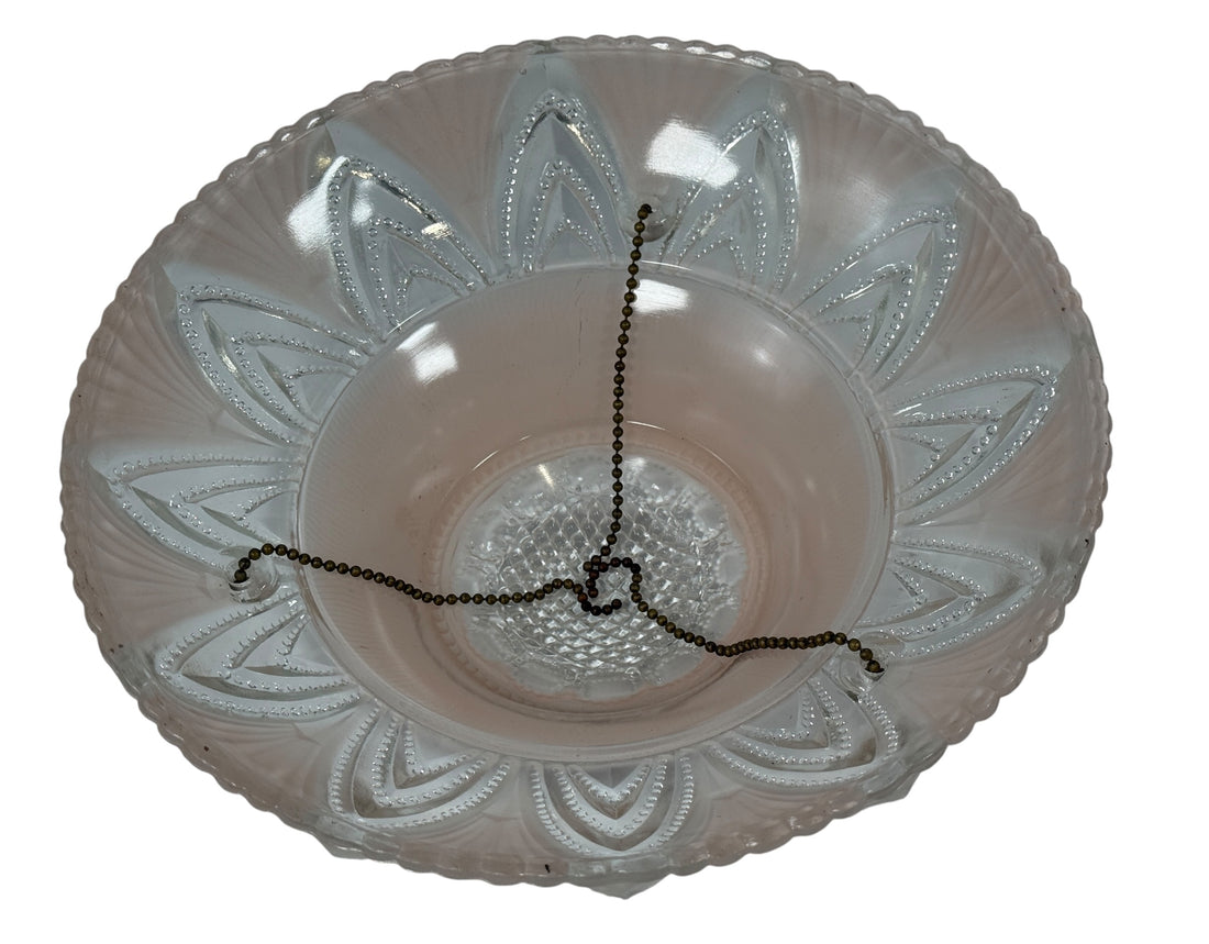 Frosted glass ceiling light fixture with decorative pattern on a white background