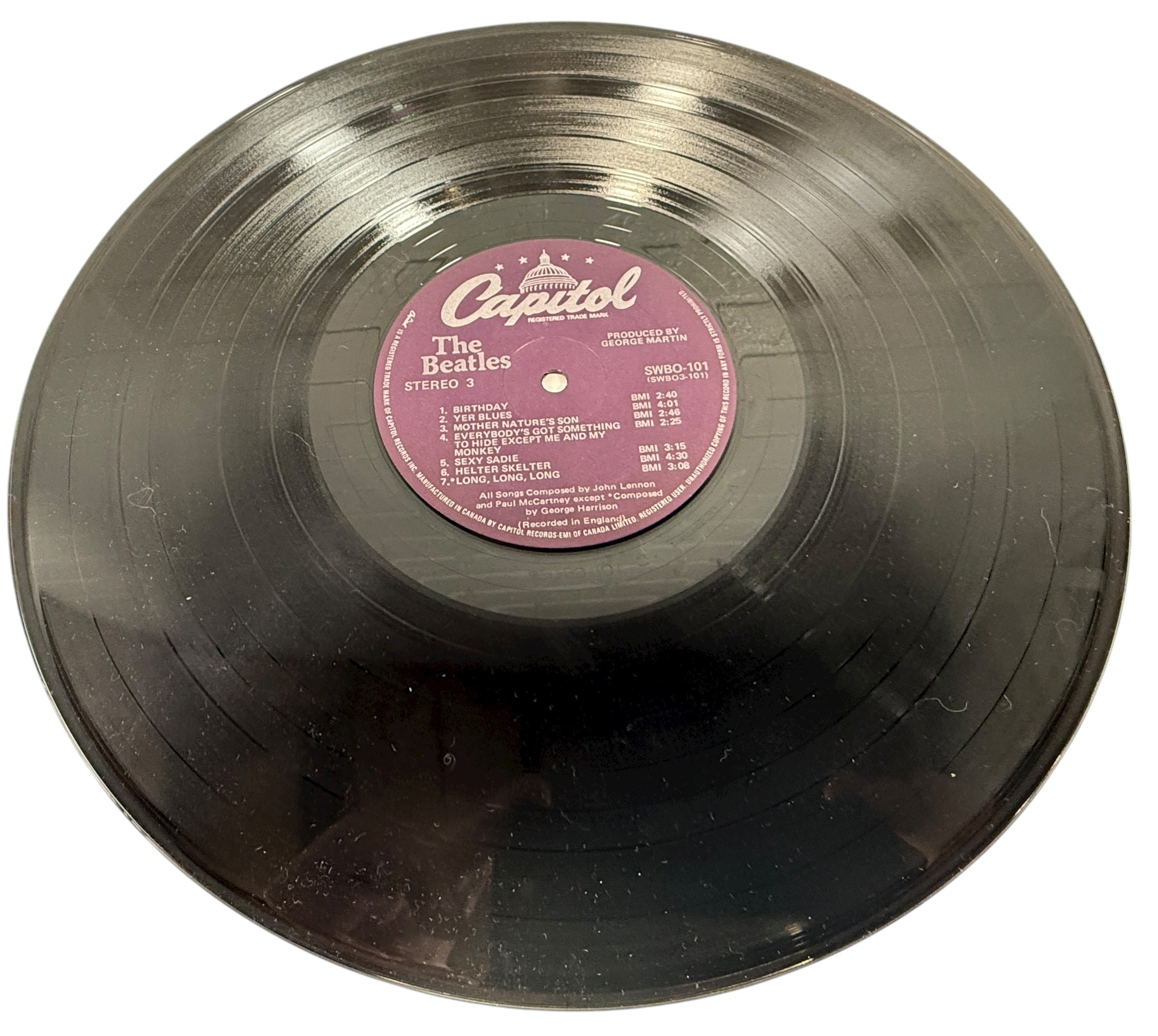 Complete Canadian pressing of The Beatles White Album with poster and all four photos. Classic SWBO-101 2LP set for collectors and vinyl fans.