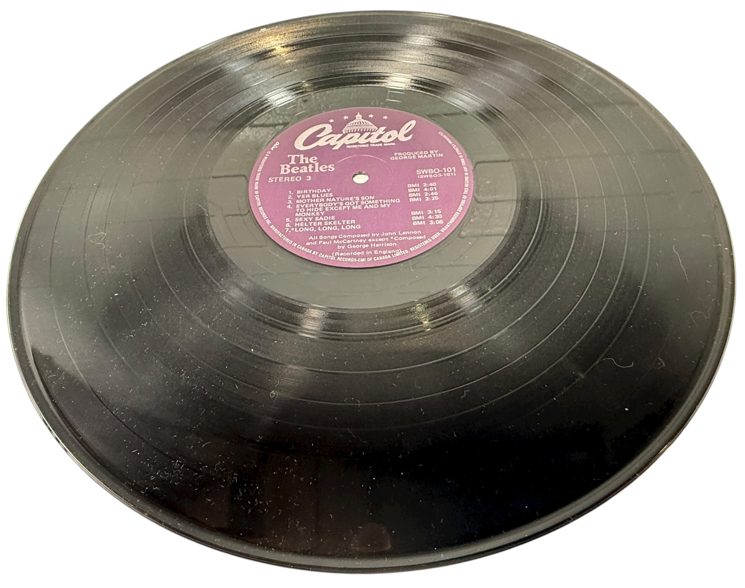 Complete Canadian pressing of The Beatles White Album with poster and all four photos. Classic SWBO-101 2LP set for collectors and vinyl fans.