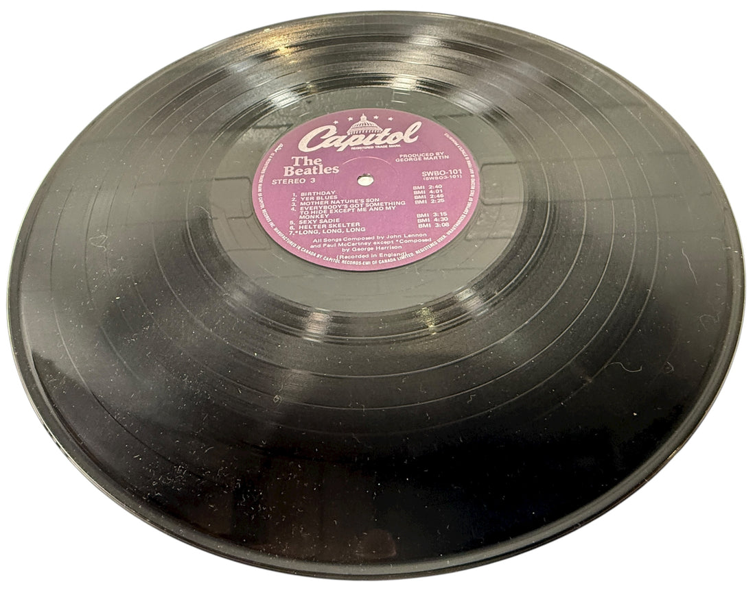 Complete Canadian pressing of The Beatles White Album with poster and all four photos. Classic SWBO-101 2LP set for collectors and vinyl fans.