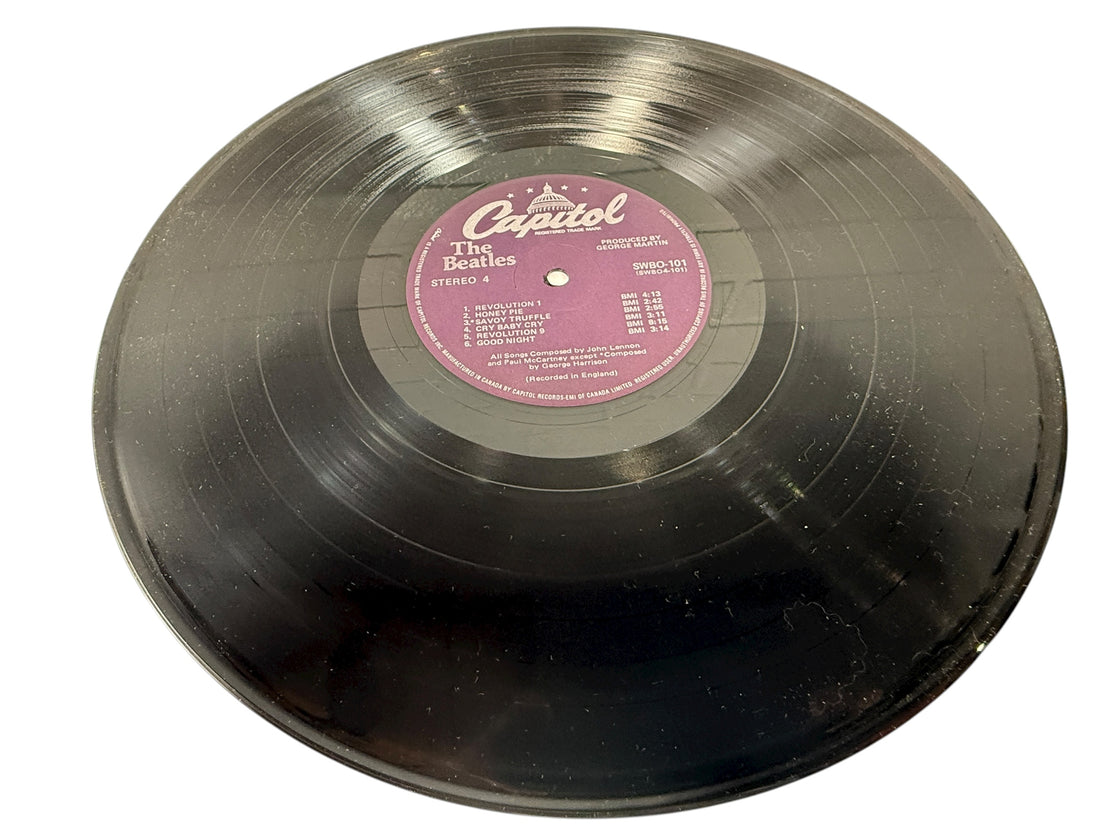 Complete Canadian pressing of The Beatles White Album with poster and all four photos. Classic SWBO-101 2LP set for collectors and vinyl fans.