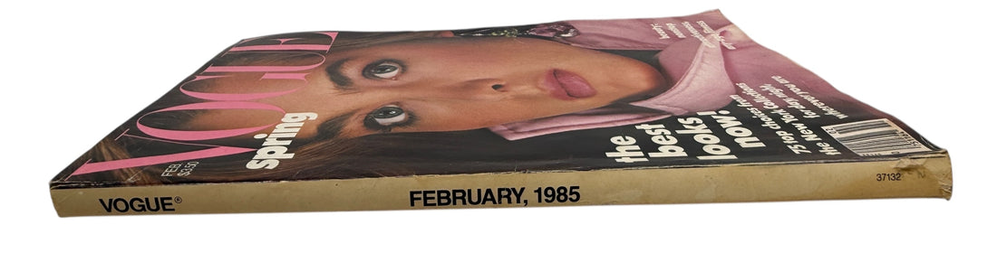 Vintage Vogue US February 1985 featuring Brooke Shields. Classic 80s spring fashion and beauty editorials. Original issue with visible spine wear.