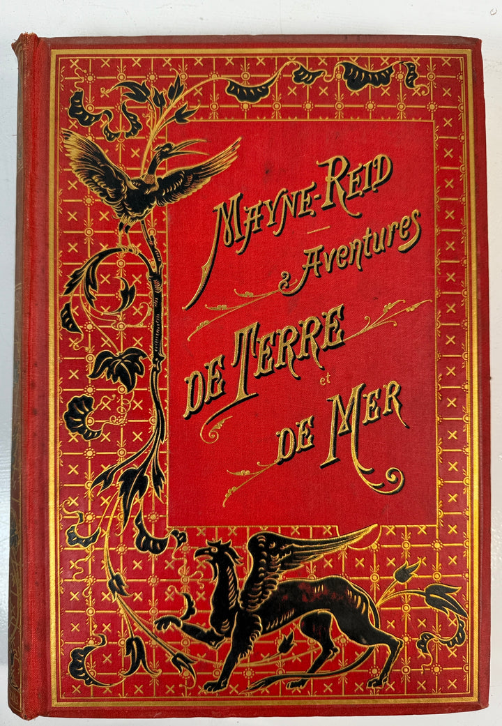 Vintage book cover with ornate design and text on a red background