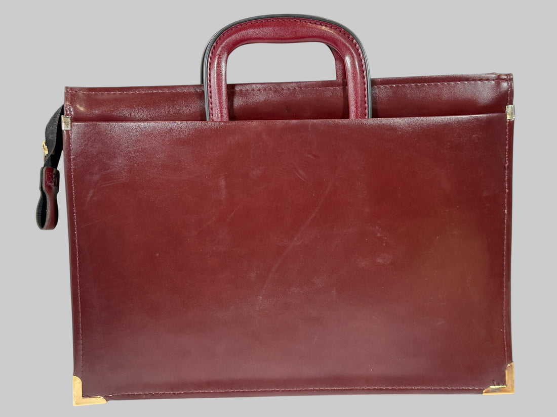 Brown leather briefcase on a white background